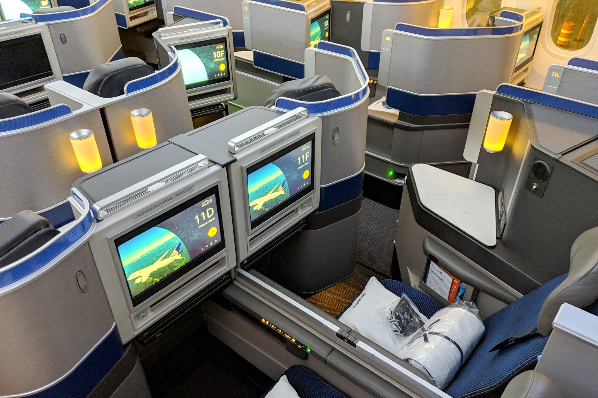 Elites can redeem PlusPoints to upgrade from economy to United Polaris business class. Photo by Zach Honig/The Points Guy.