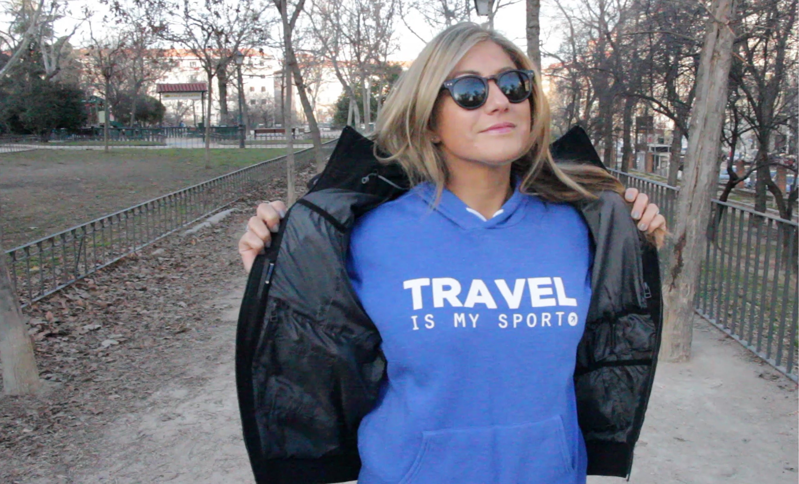 TPG writer Lori Ziano models a TPG sweatshirt and a jacket. THE POINTS GUY