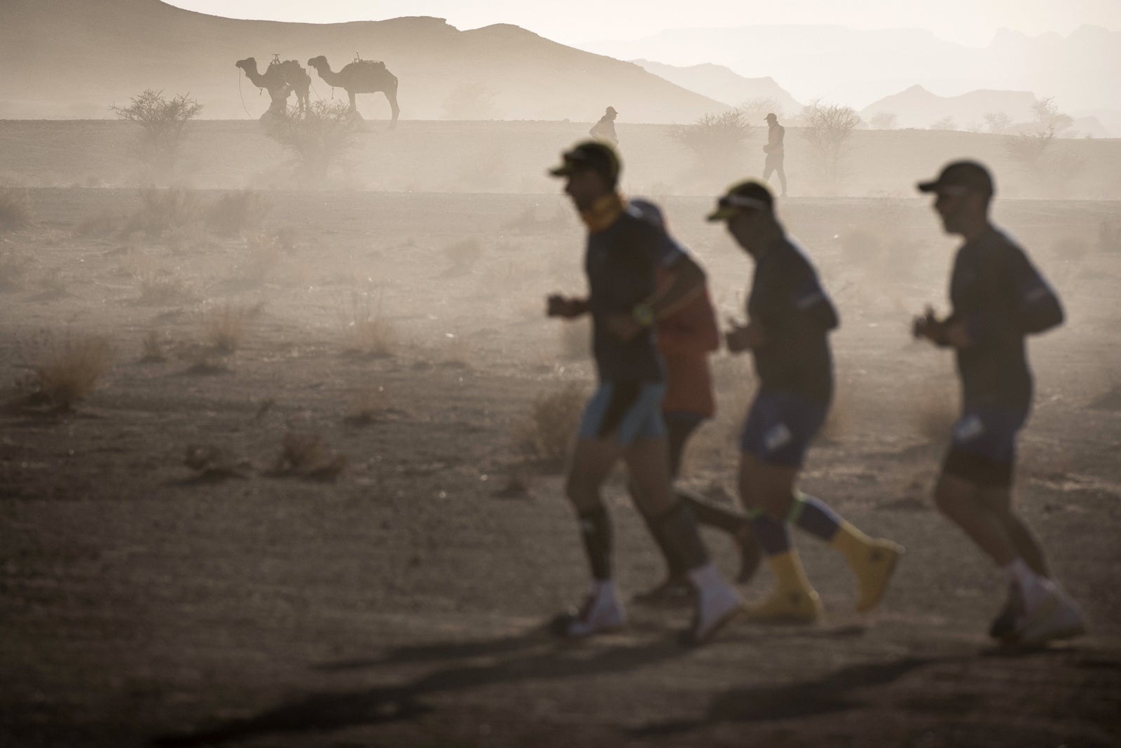 Runners at the Marathon des Sables in the Sahara Desert. (Photo by JEAN-PHILIPPE KSIAZEK/AFP/Getty Images)