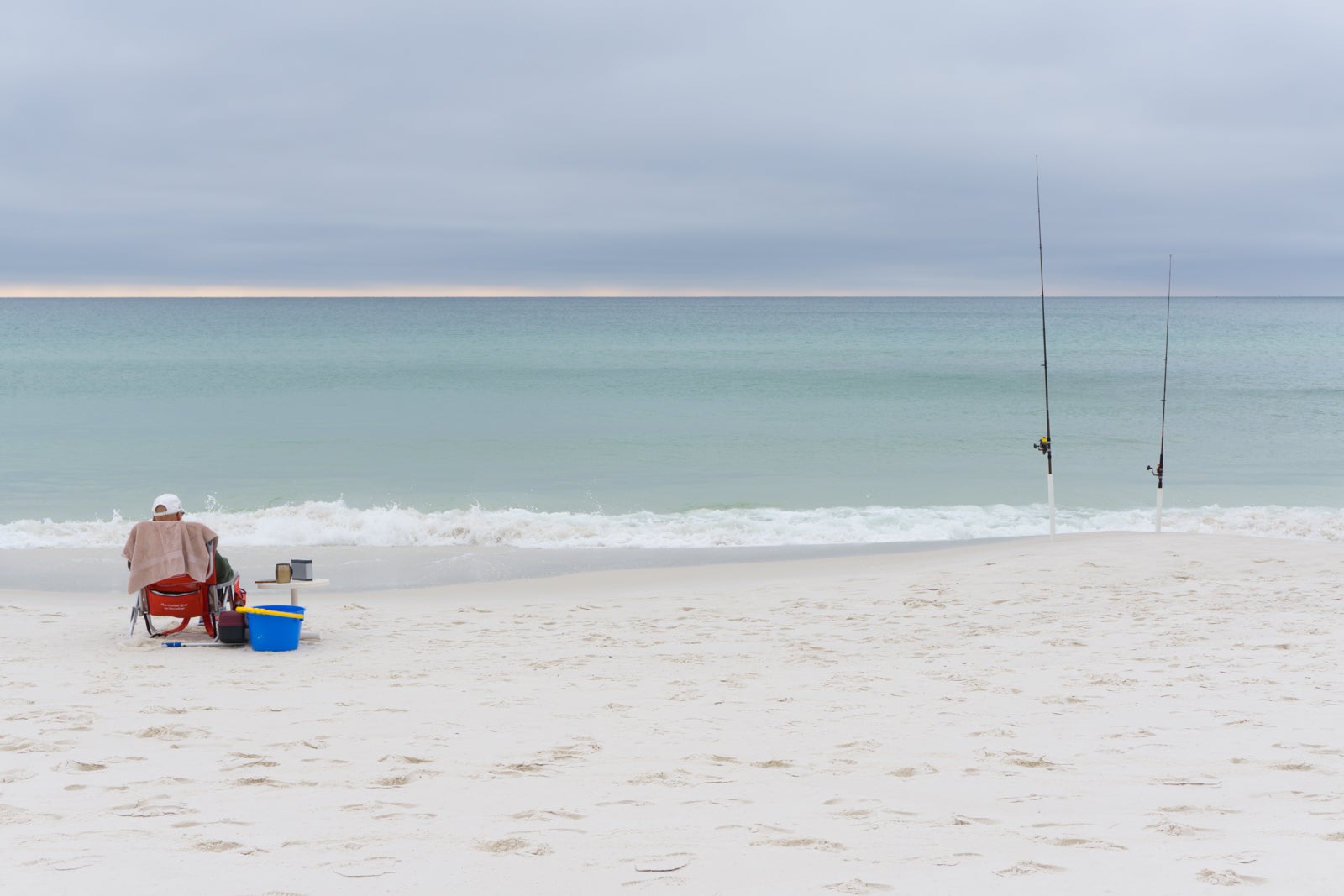 Fishing on the white sand beach of Destin. (Photo via Getty Images)
