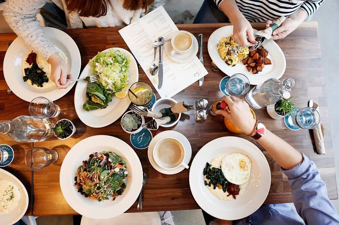 overhead view of multiple people dining together