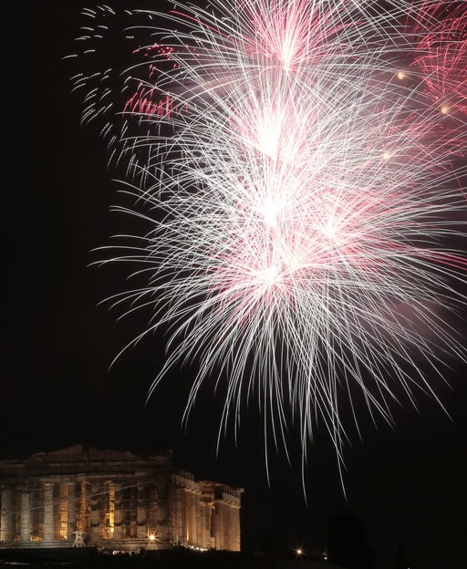 Fireworks over the Parthenon temple atop the Athens Acropolis hill during New Year's day celebrations.
