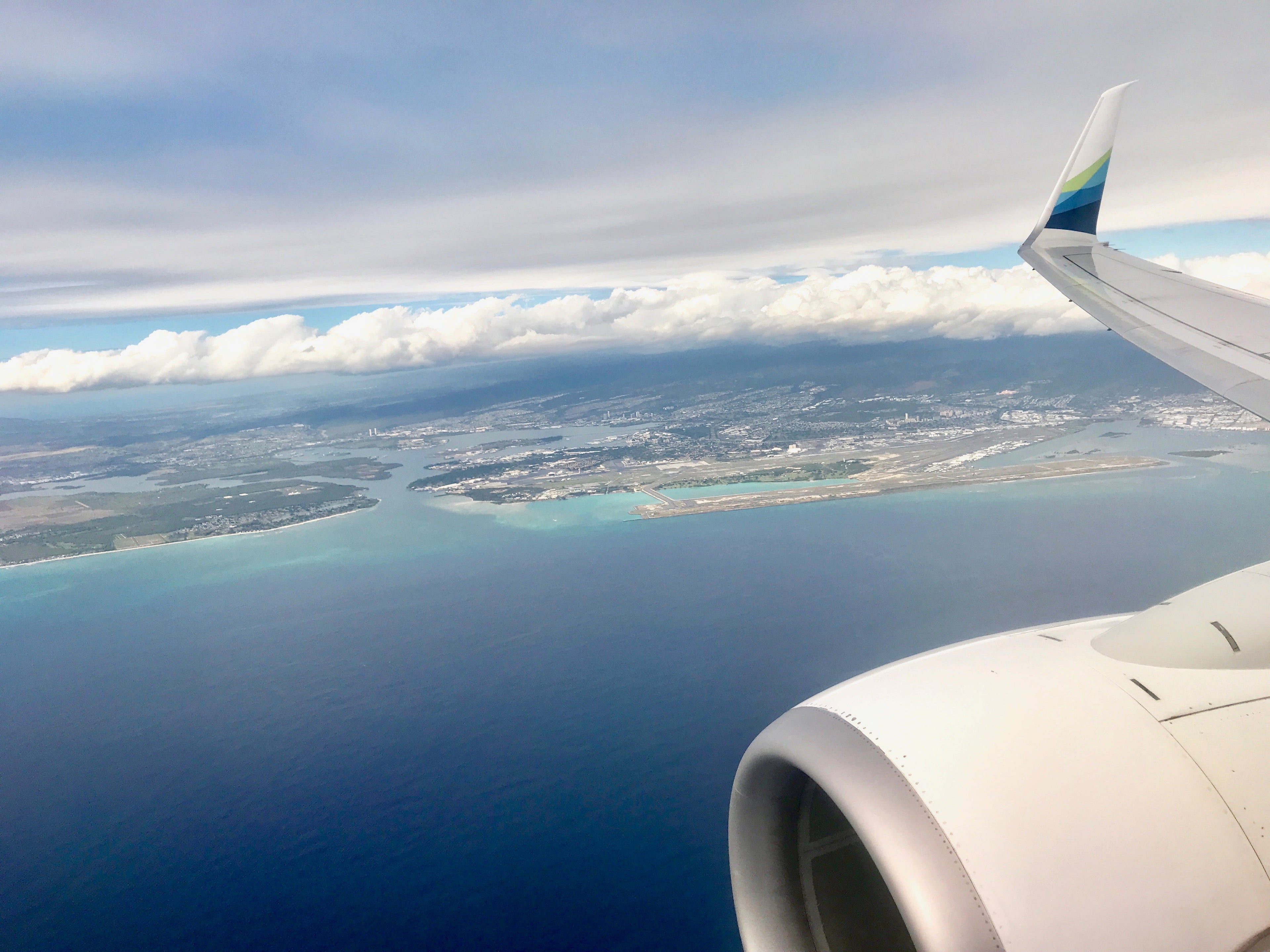 Alaska Airlines jet over Honolulu Oahu Hawaii