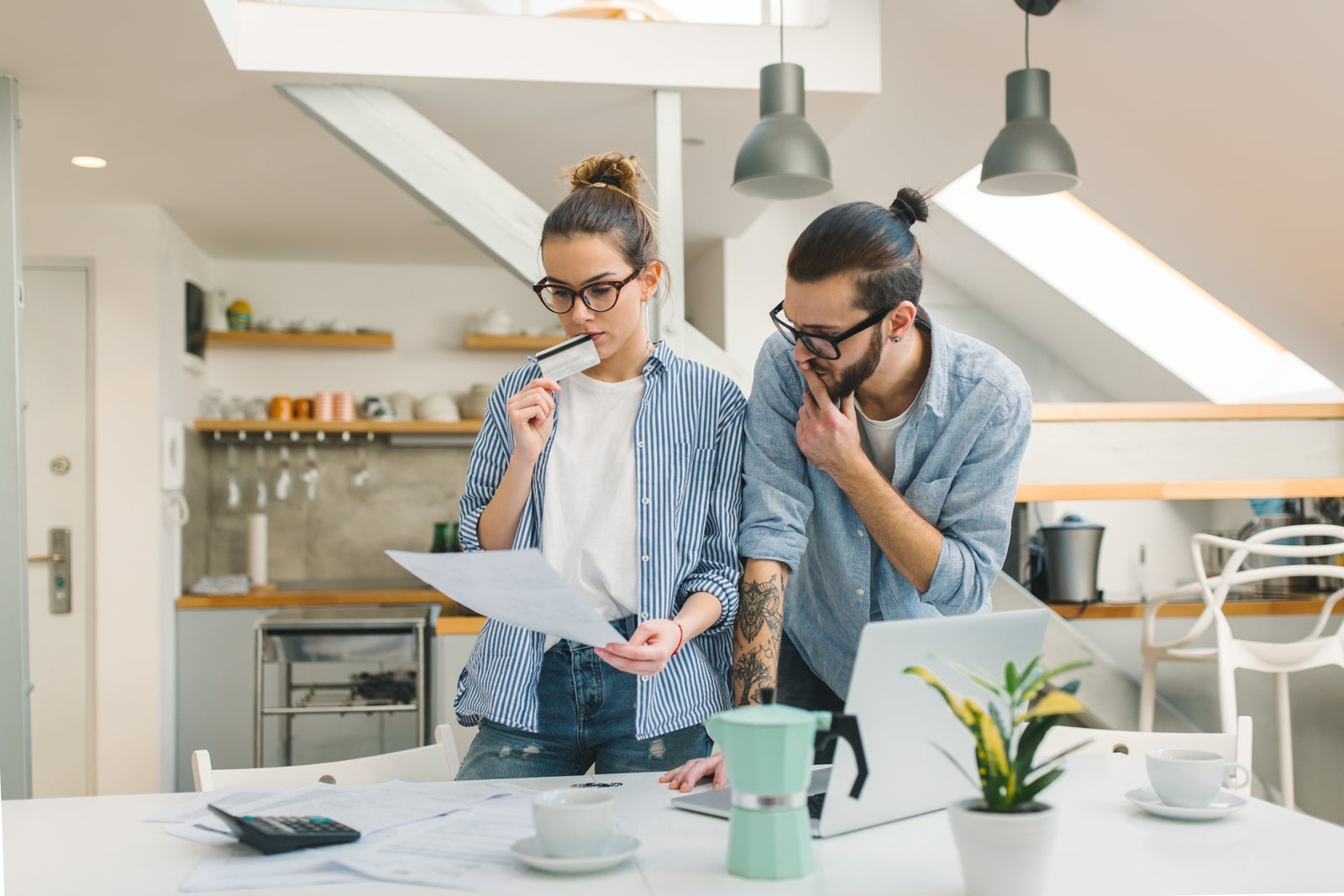 a couple looks at a report