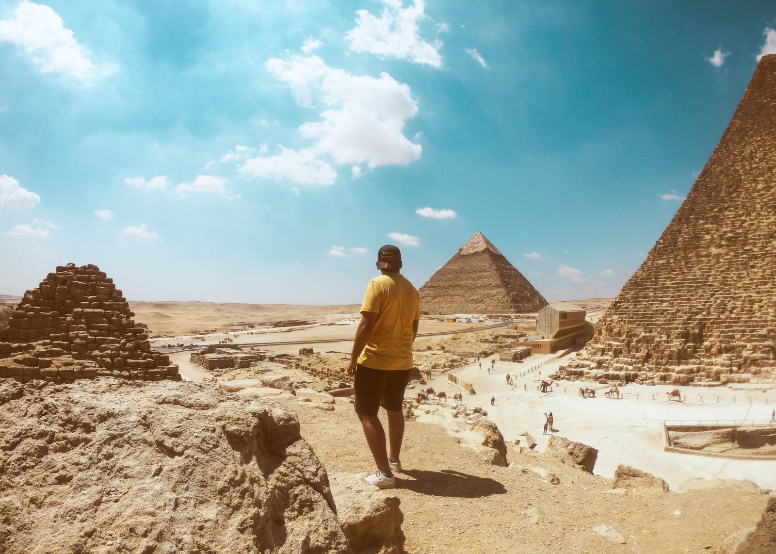 Check out the pyramids when visiting Cairo. (Photo by Omar Elsharawy/Unsplash)