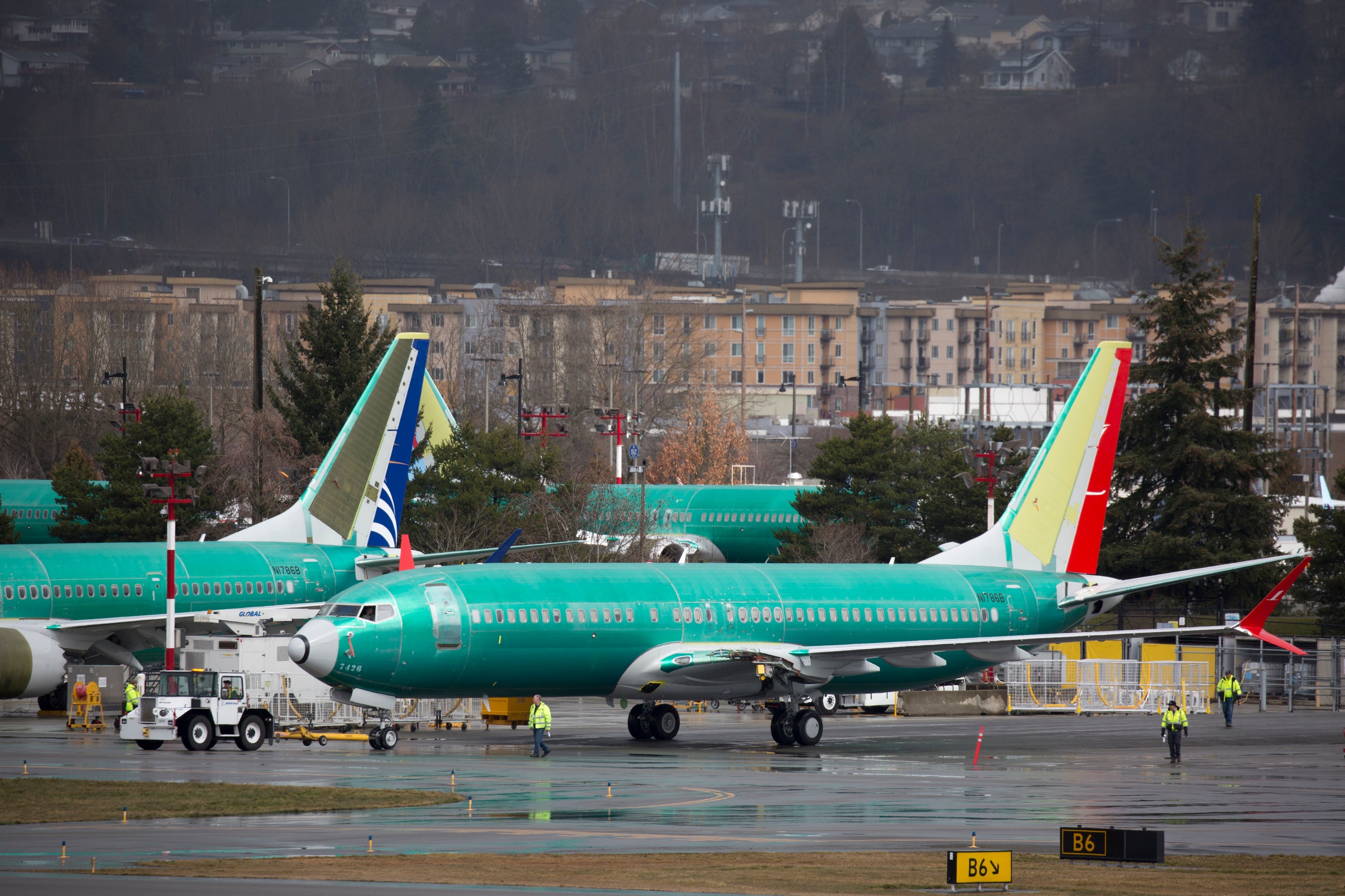Boeing 737 airplanes are pictured on the tarmac at the Boeing Renton Factory in Renton, Washington on March 12, 2019. - The US said there is "no basis" to ground Boeing 737 MAX airplanes, after a second deadly crash involving the model in less than five months prompted governments worldwide to ban the aircraft. "Thus far, our review shows no systemic performance issues and provides no basis to order grounding the aircraft," Federal Aviation Administration (FAA) chief Daniel Elwell said in a statement. (Photo by Jason Redmond / AFP) (Photo credit should read JASON REDMOND/AFP/Getty Images)