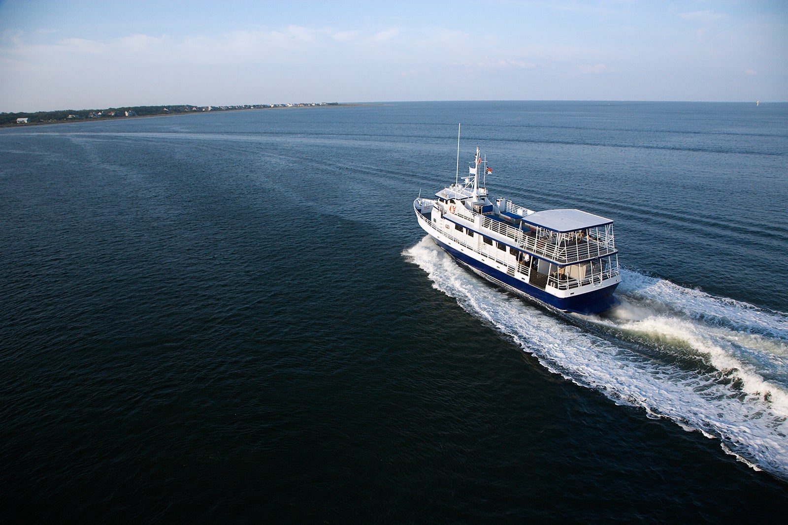 Ferry boat transporting passengers. (Photo by Fotosearch/Getty Images)
