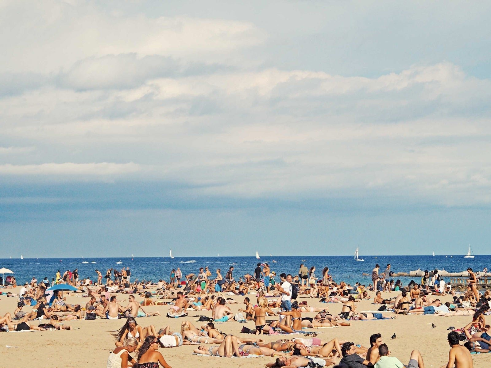 Since the weather is so warm, you can wear your beach clothes around town during the summer. (Photo by Federico Giampieri/Unsplash)
