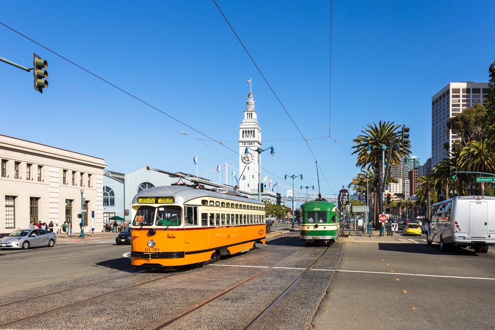 The tramway on the Embarcadero along San Francisco waterfront in California, USA. The clock tower in the background in the historic ferry terminal building. (Photo by Didier Marti / Getty Images)