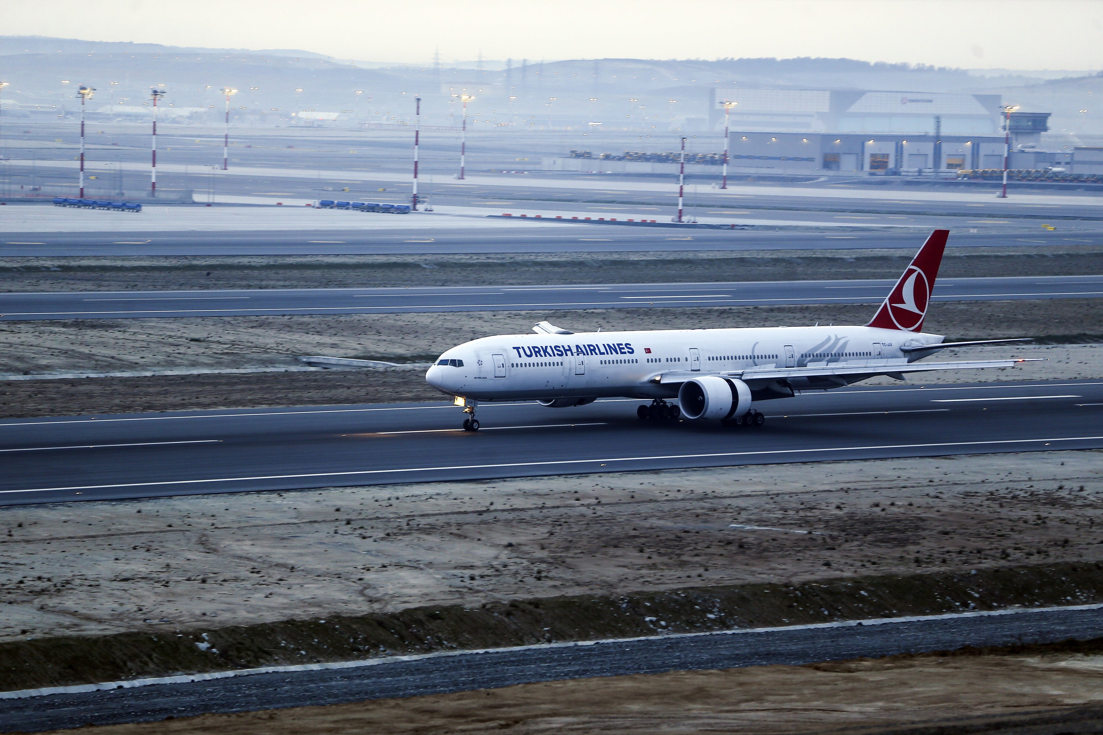 ISTANBUL, TURKEY APRIL 05: Turkish Airlines plane, took off from Ataturk Airport without passengers, is seen landing at new Istanbul Airport, on April 05, 2019 in Istanbul, Turkey. The big switch from Ataturk Airport to the new mega-Istanbul Airport started. Starting on April 5 at 3.00 a.m. local time (0000GMT), the initial moving operation will take a total of 45 hours. Istanbul Airport, the world's new hub", officially opened on October 29, 2018, the 95th anniversary of the founding of the Turkish Republic. (Photo by Serhat Cagdas/Anadolu Agency/Getty Images)