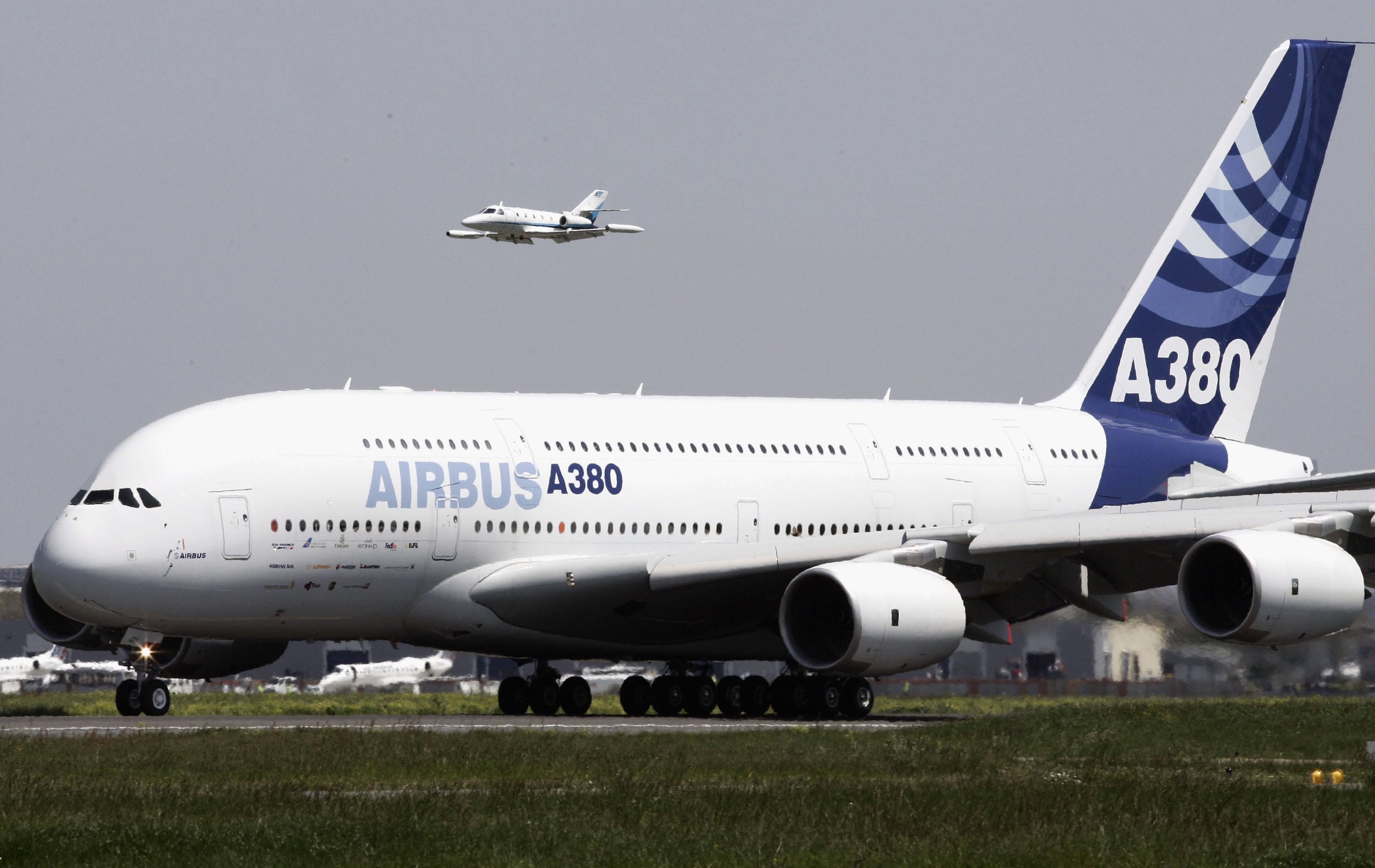 TOULOUSE, FRANCE - APRIL 27: The A380, the world's largest commercial airliner, is seen as it makes its maiden flight on April 27, 2005 in Toulouse, southern France. The four-engine superjumbo can carry up to 840 passengers and fly 8,000 miles (15,000 kilometers) non-stop. It took 11 years of preparation and $13 billion in spending before the first test flight took place as some 50,000 officials, spectators and media were gathered to watch history being made. (Photo by Pascal Le Segretain/Getty Images)