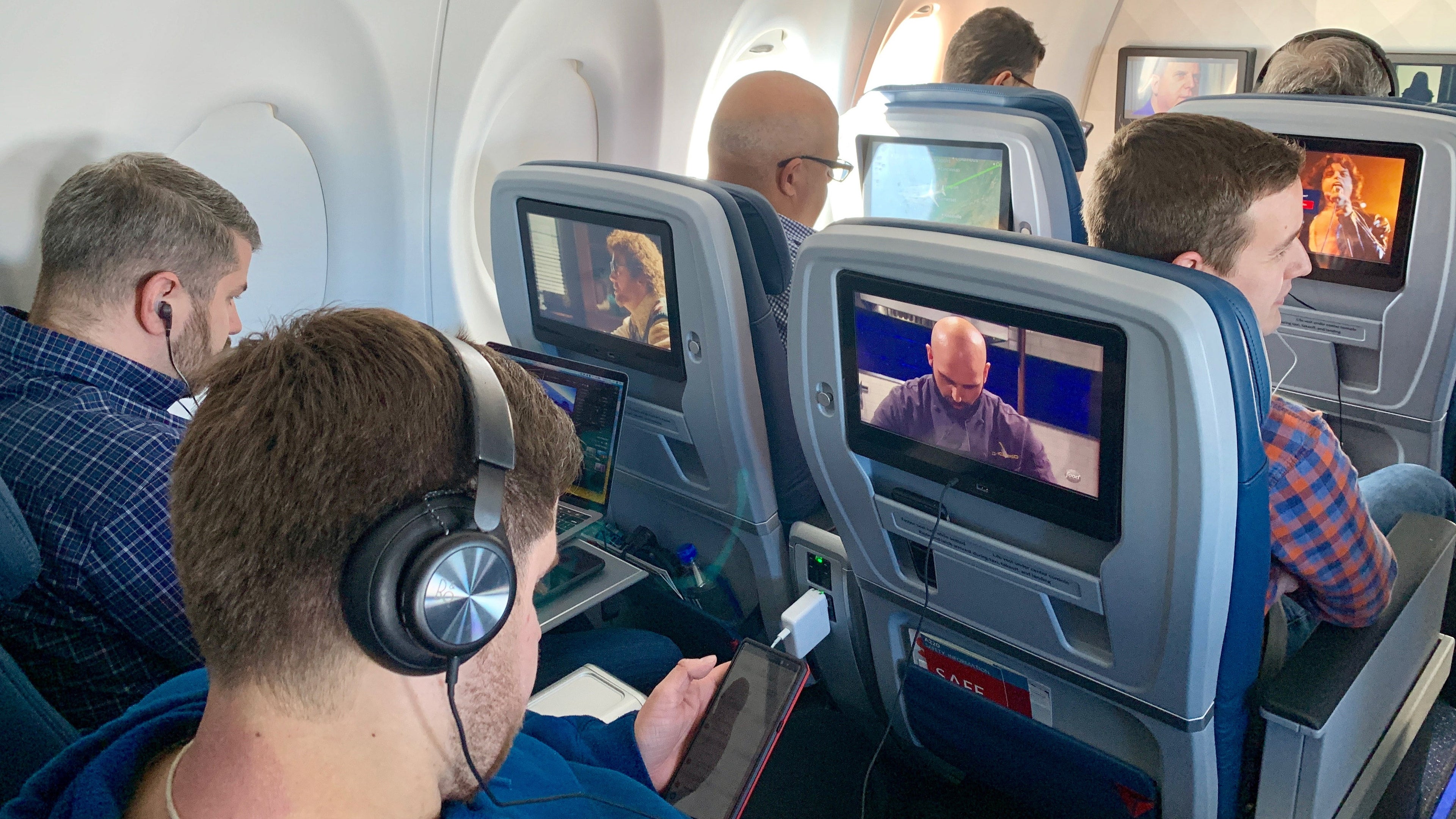 First class passengers aboard a Delta A220