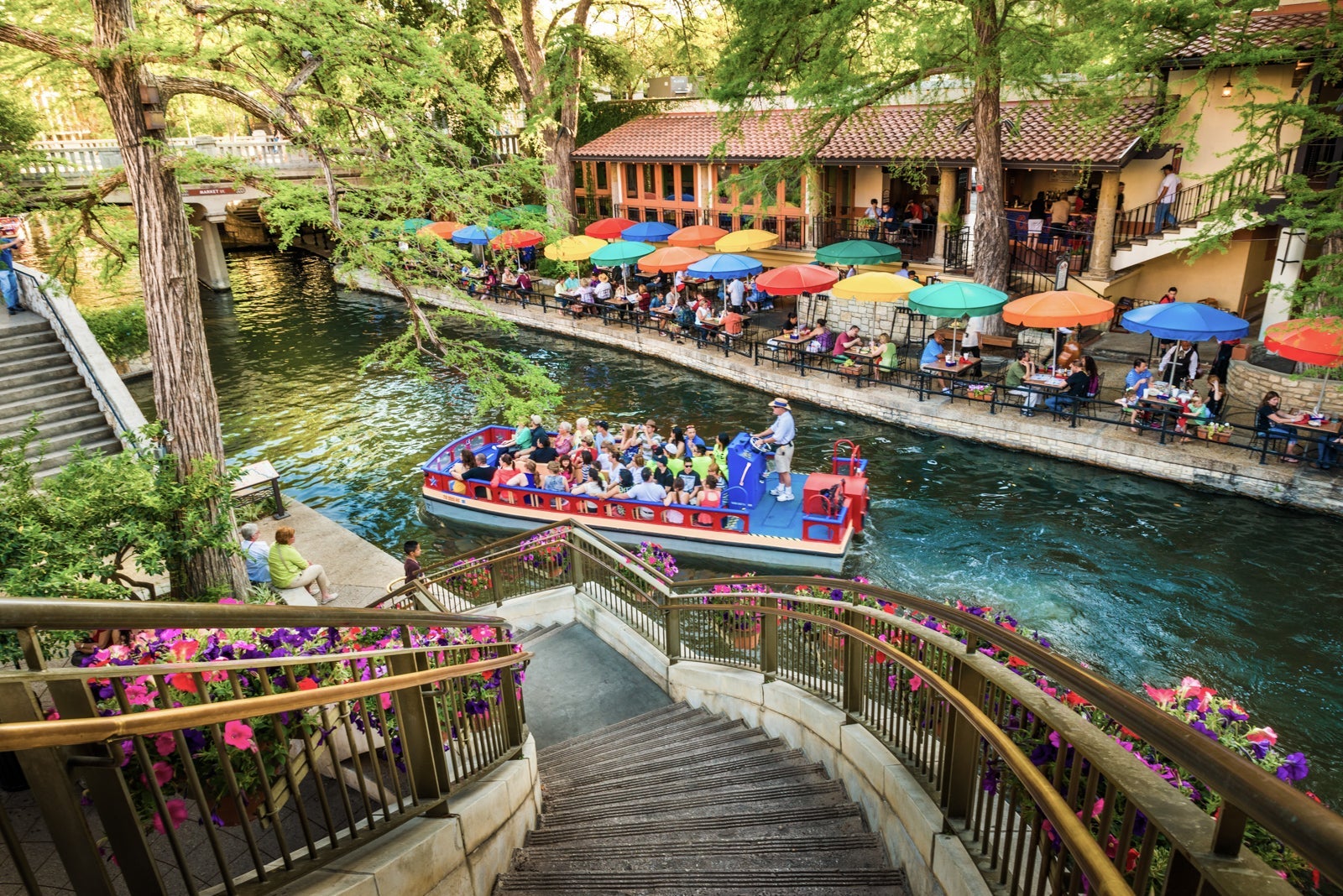 The riverwalk, San Antonio park walkway scenic canal tour boat