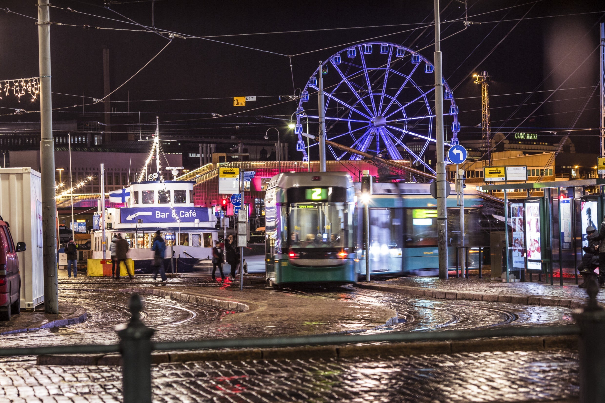 Helsinki's Market Square is fun day or night, and a ride on the SkyWheel offers great views of downtown. (Photo credit: Elise Kulmala)