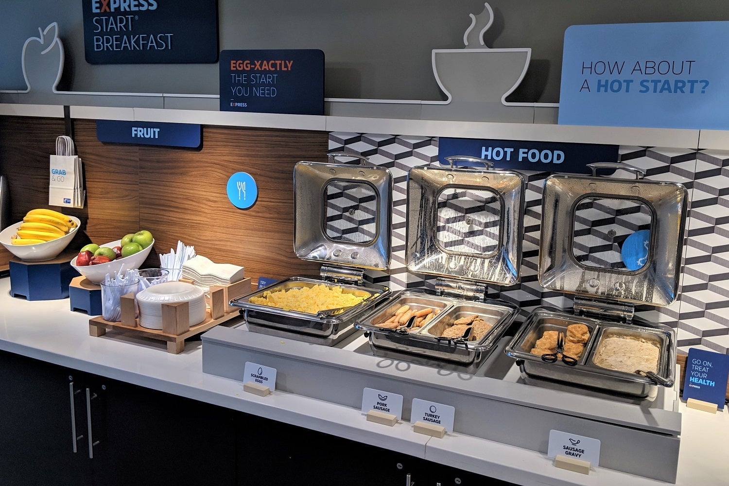 hot dishes on a hotel breakfast bar