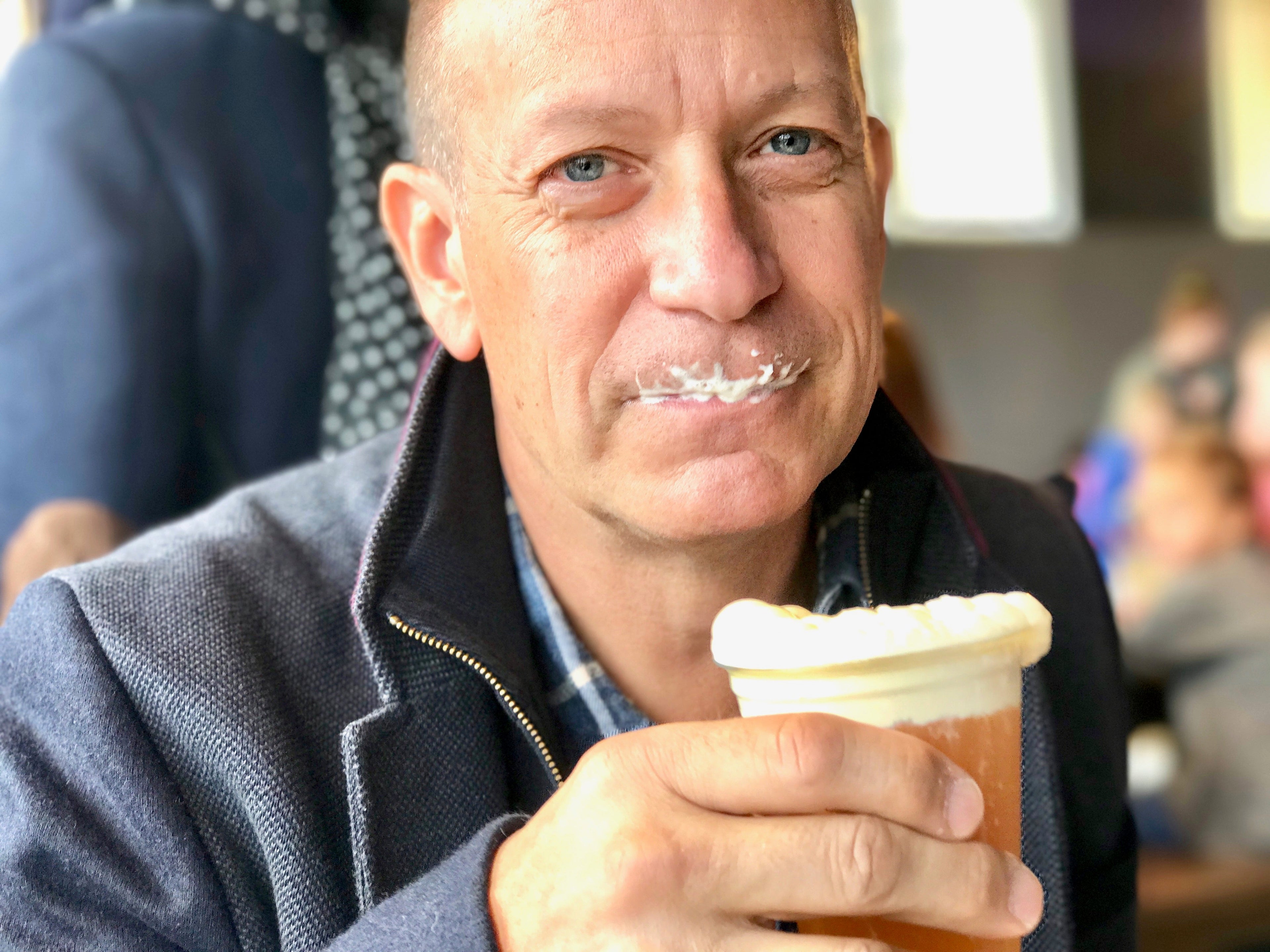 sampling butter beer at Harry Potter Studios London