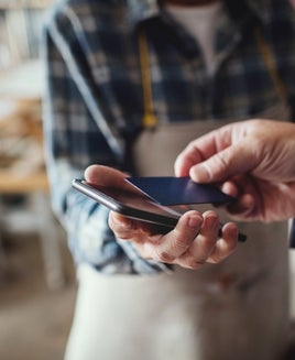 Customer paying a bill with a card
