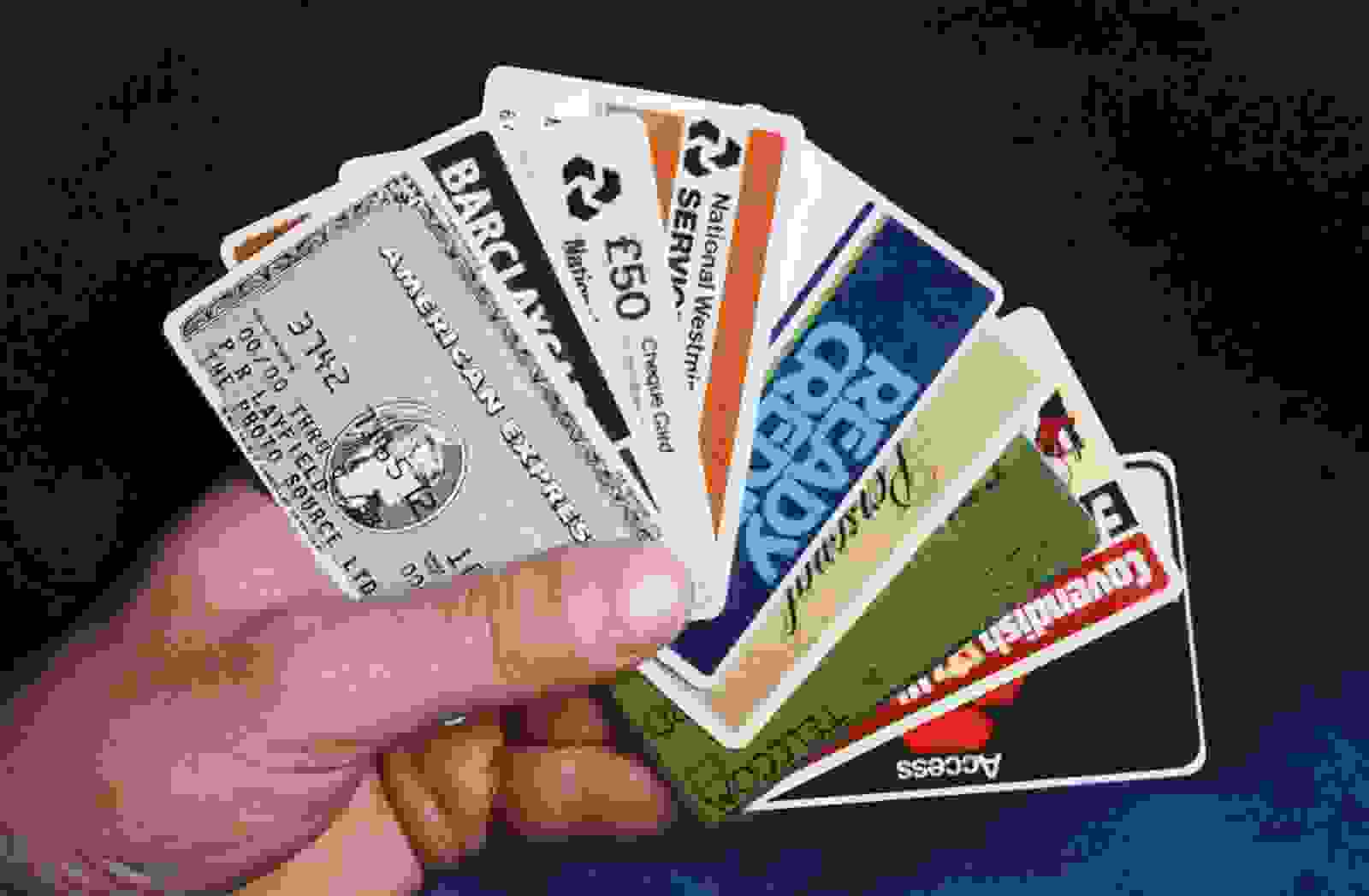 A selection of credit and bank cards, along with a green British Telecom phone card in 1986. (Photo by Fox Photos / Hulton Archive / Getty Images)
