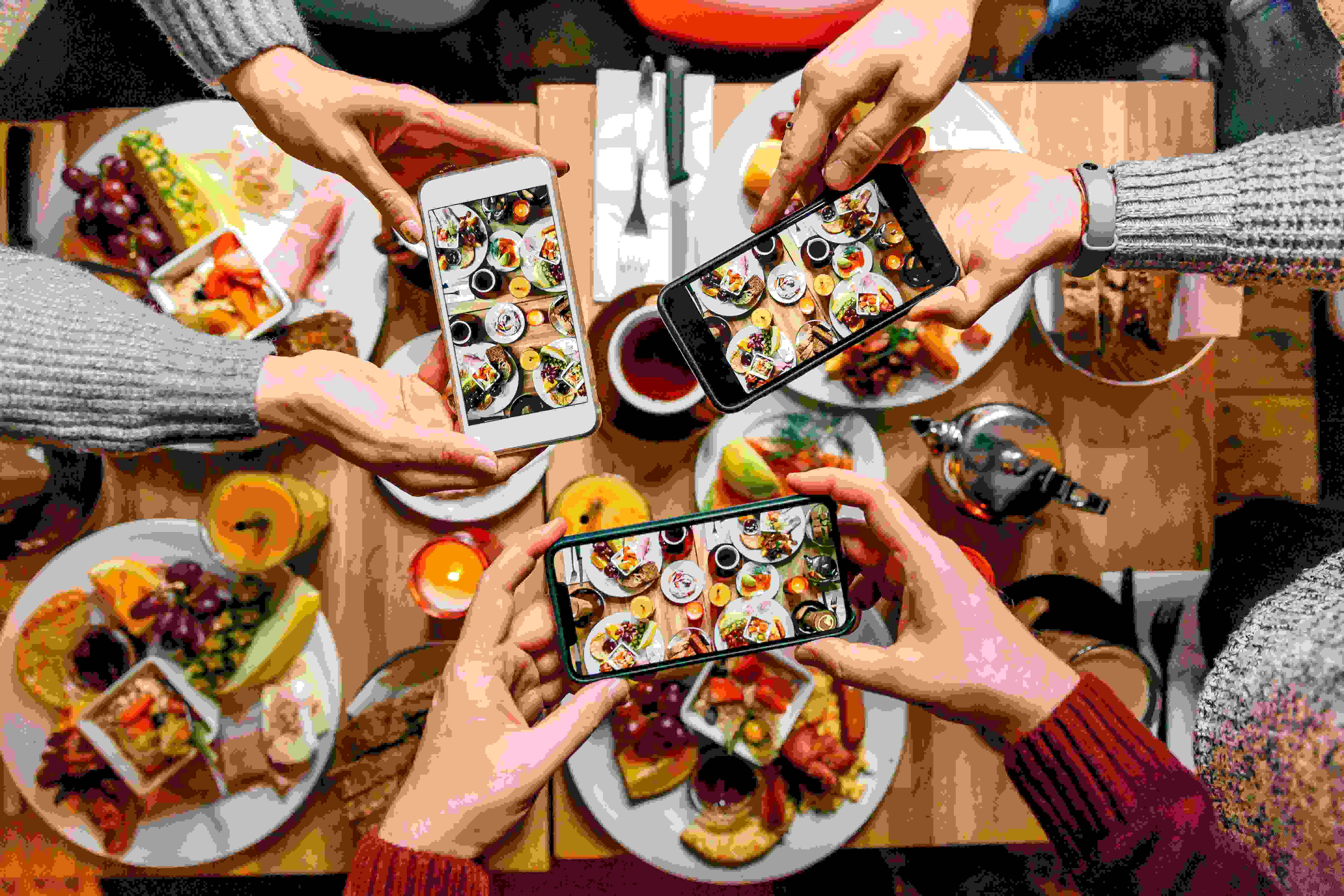 People taking photos of their food