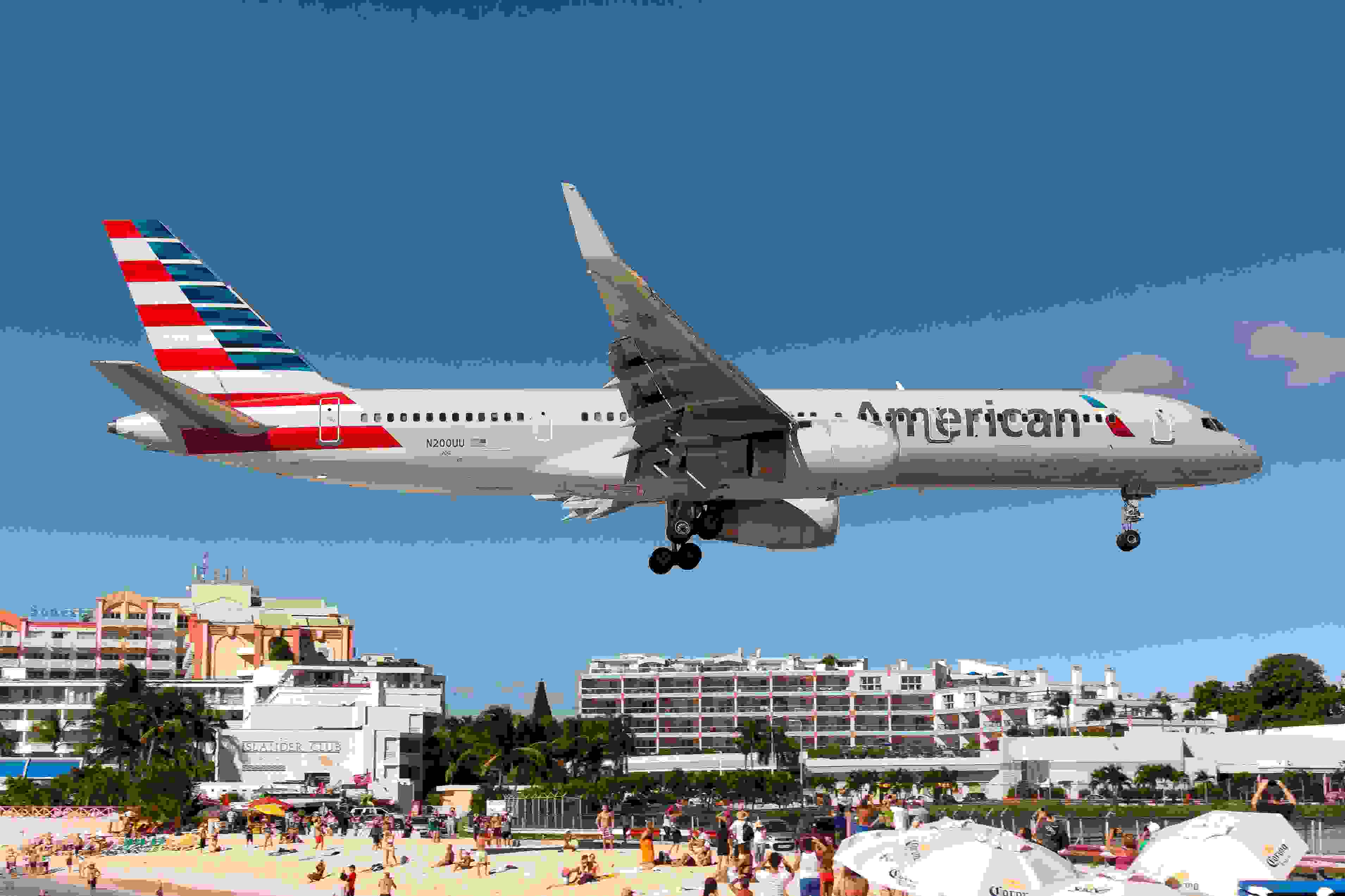 AIRPORT PRINCESS JULIANA, SIMPSON BAY, GUADELOUPE - 2016/12/05: An American Airlines Boeing 757-200 seen landing at airport Princess Juliana just over Maho beach. (Photo by Fabrizio Gandolfo/SOPA Images/LightRocket via Getty Images)