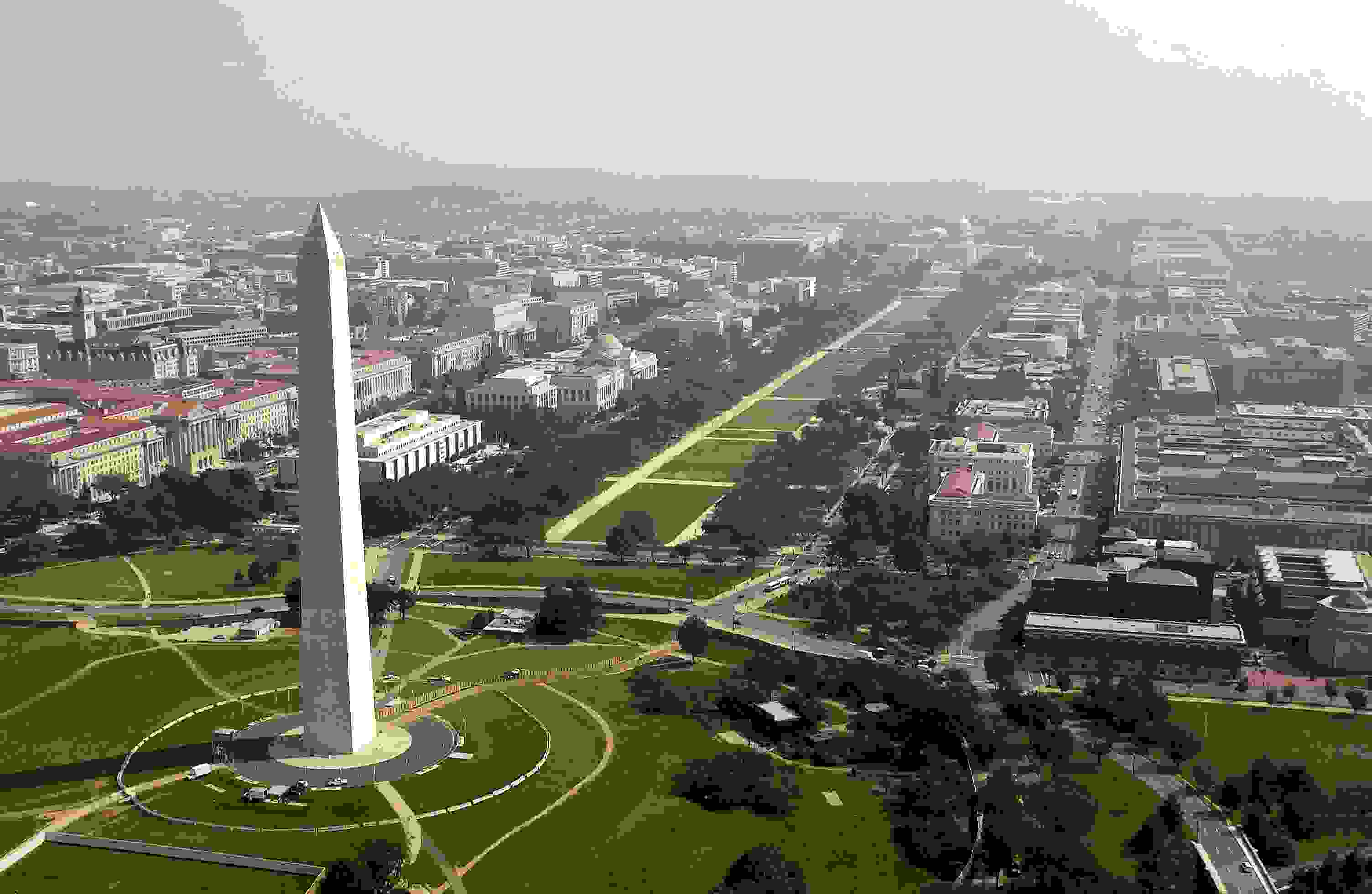 Aerial photo of the Washington Monument with the Capitol in the background. (Photo by Andy Dunaway/USAF via Getty Images)