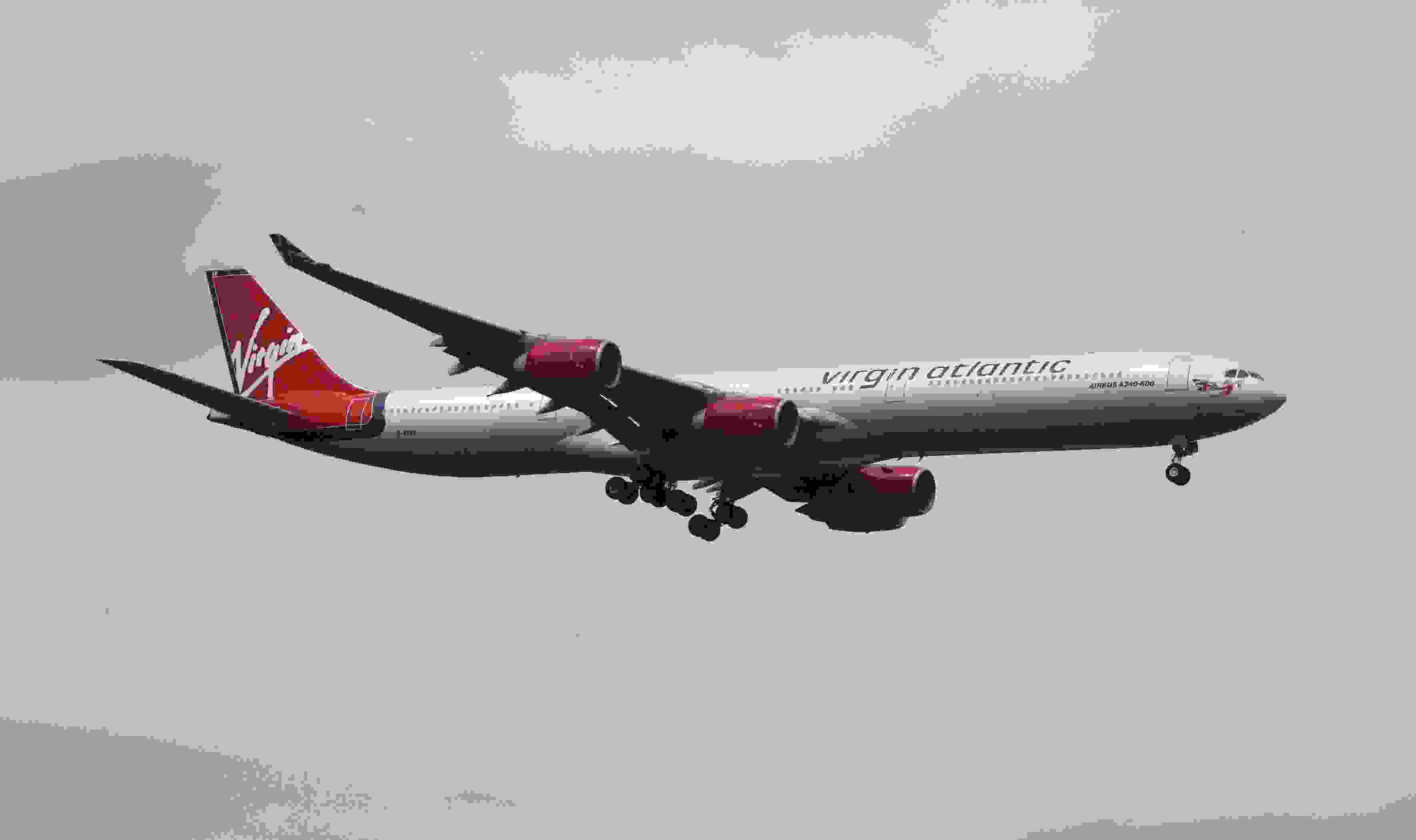 A Virgin Atlantic Airbus A340 plane lands at Heathrow Airport in Middlesex (Photo by Steve Parsons - PA Images/PA Images via Getty Images)