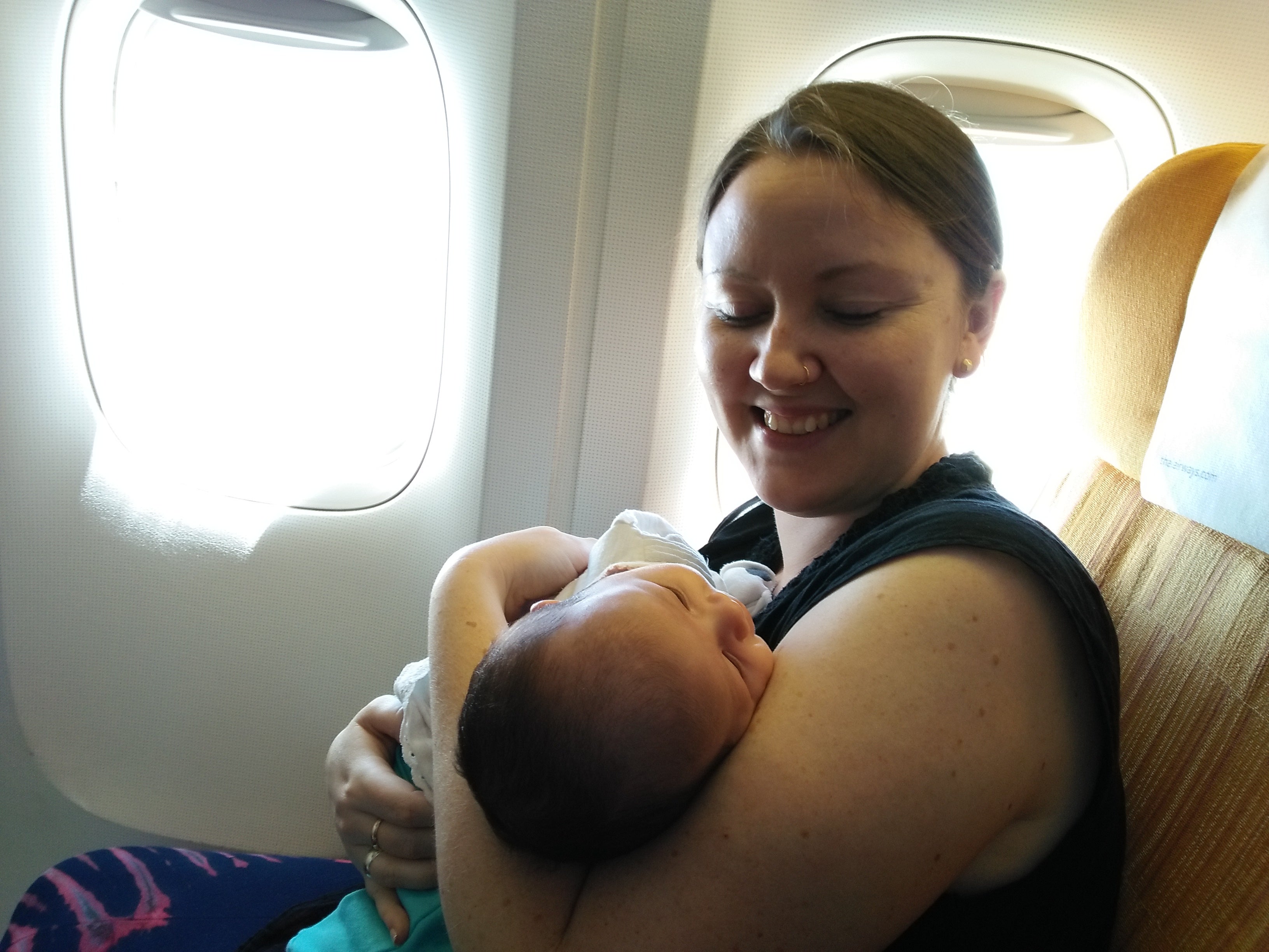 My one-month-old daughter on her first international flight, from Bangkok to Kathmandu