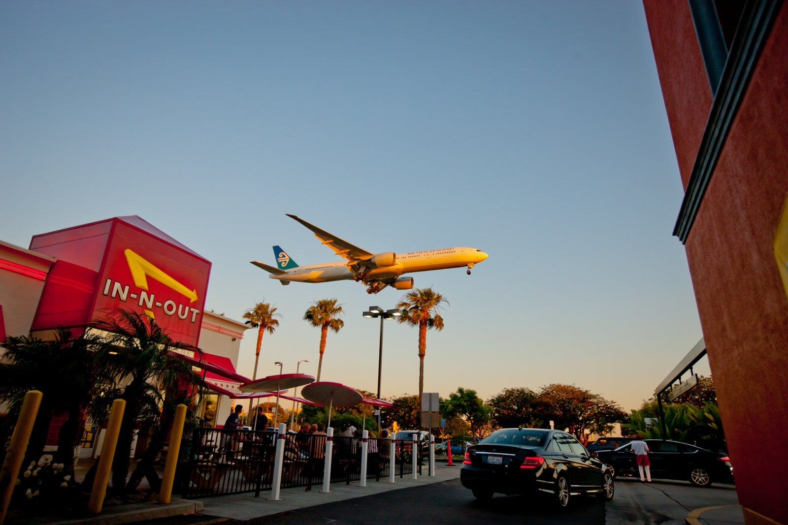 Airplane flying over the In-n-Out Burger near LAX. (Photo by anouchka / Getty Images_