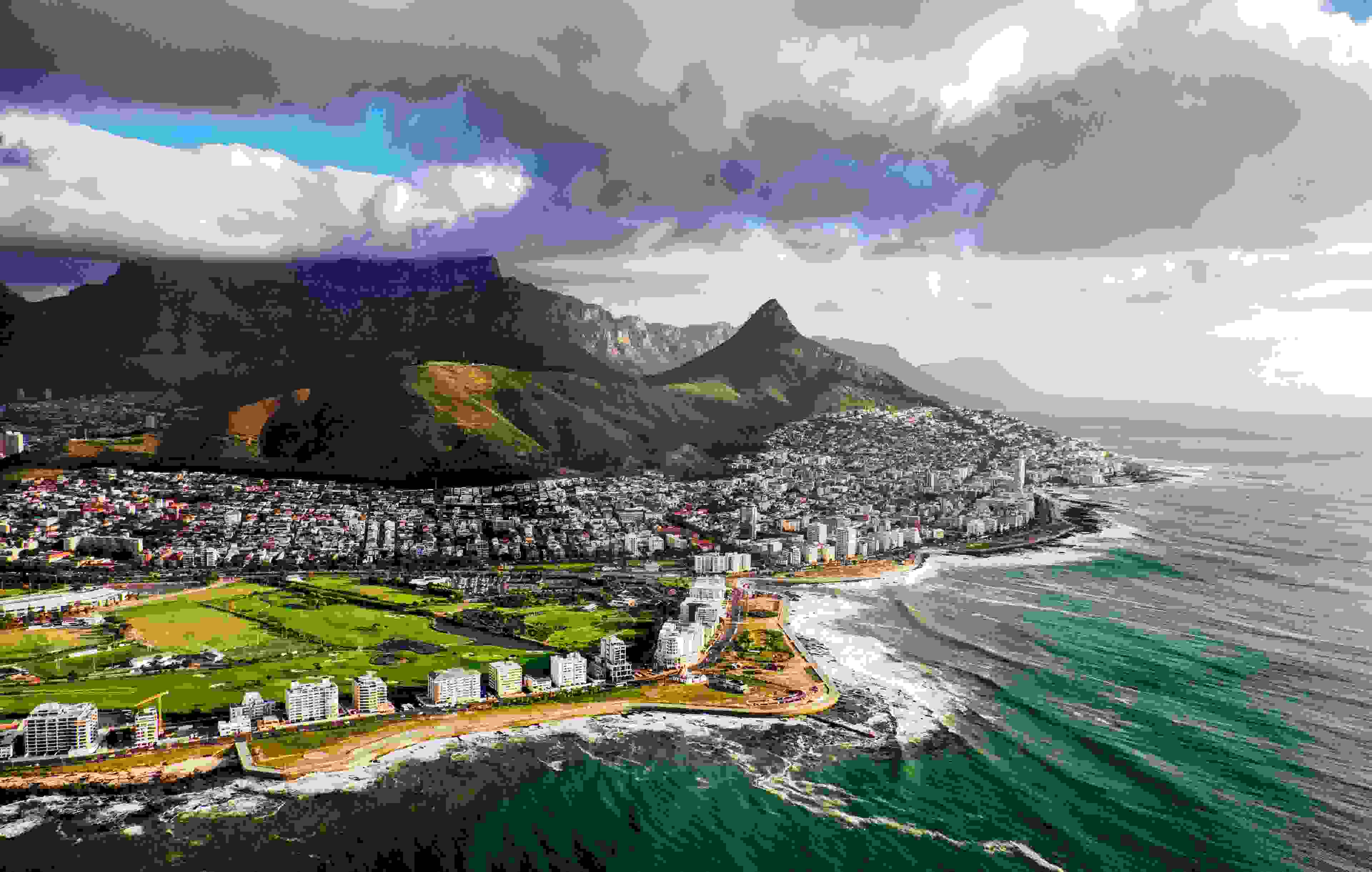 Sprawling view of Cape Town and the Mountains that frame it, Table Mountain and Lion's Head. Photo by Vicki Jauron, Babylon and Beyond Photography / Getty Images.