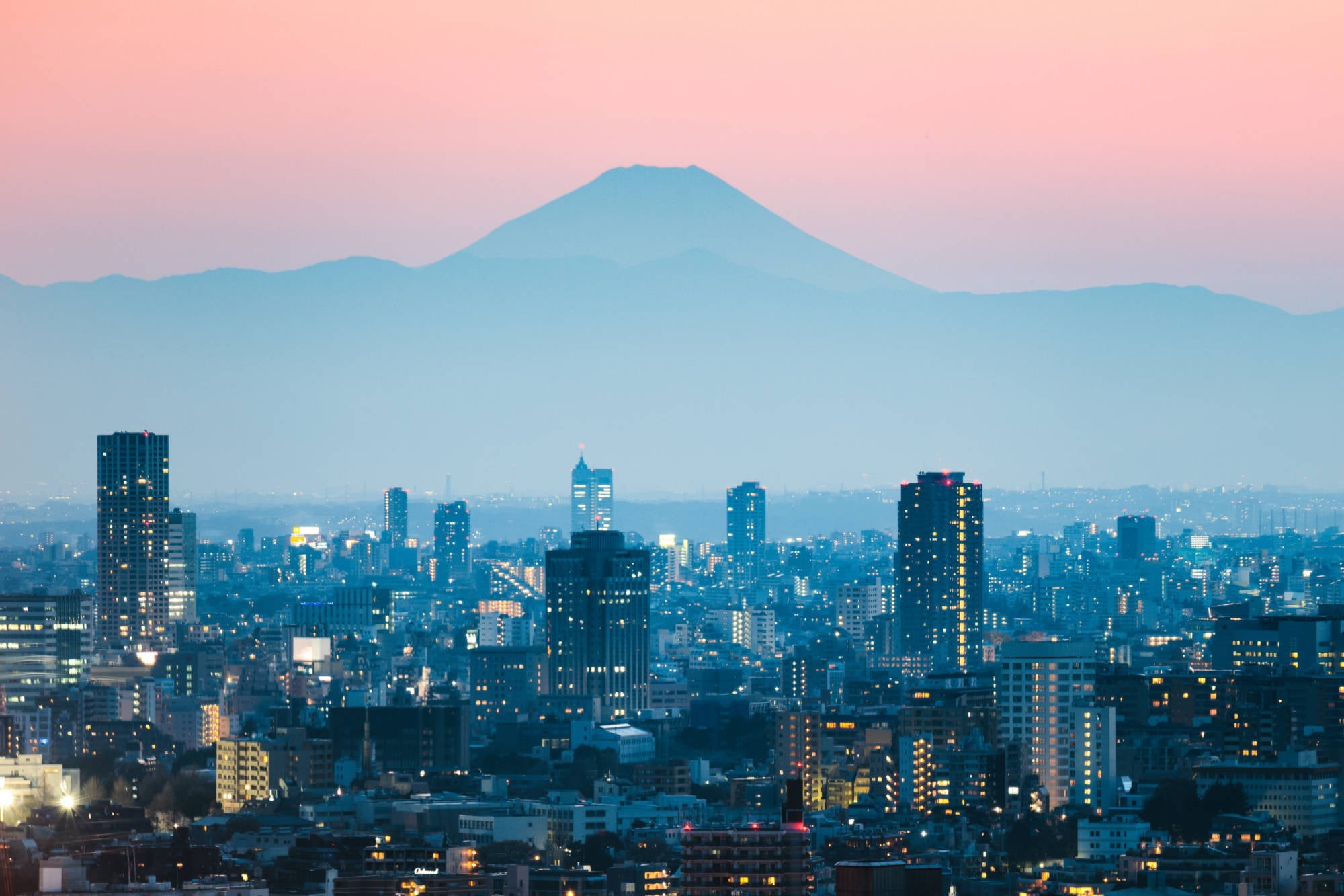Mt. Fuji and Tokyo downtown at sunset. Tokyo, Japan (Photo by Matteo Colombo/Getty Images)
