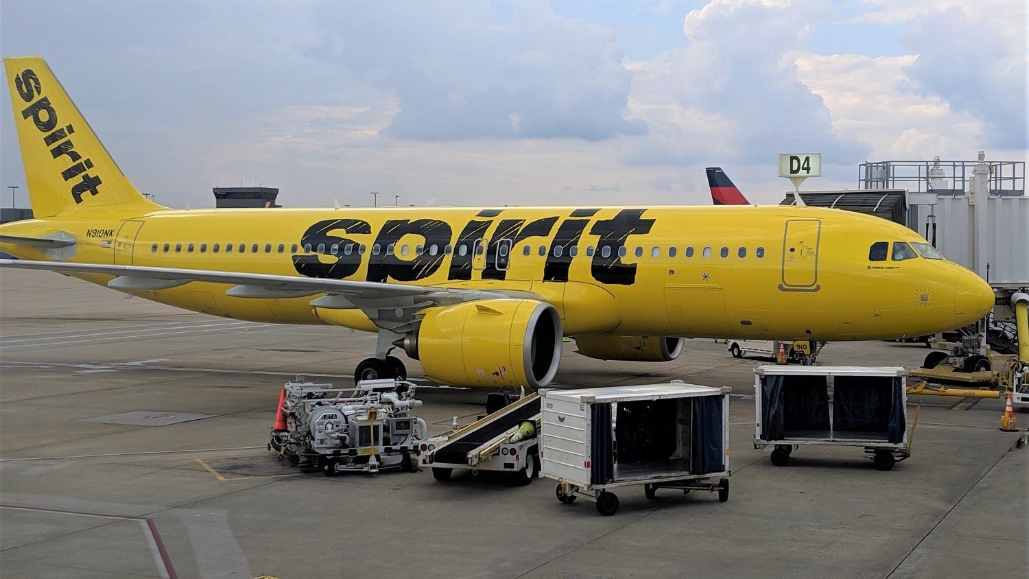 Spirit plane at gate in ATL JT Genter