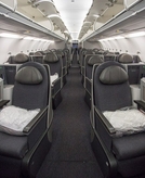 Here’s how to use airline miles for a first class upgrade