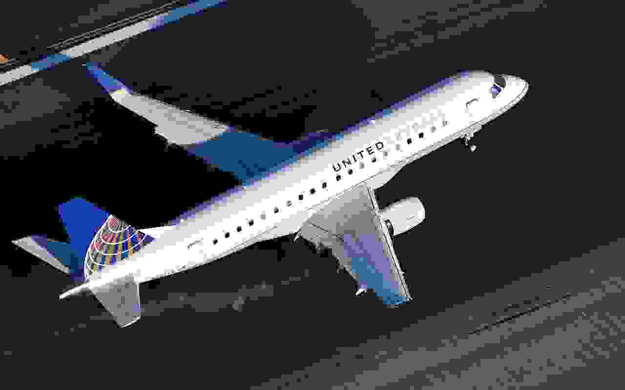 A United Express Embraer 175 landing at Newark airport (Photo by Alberto Riva/TPG)