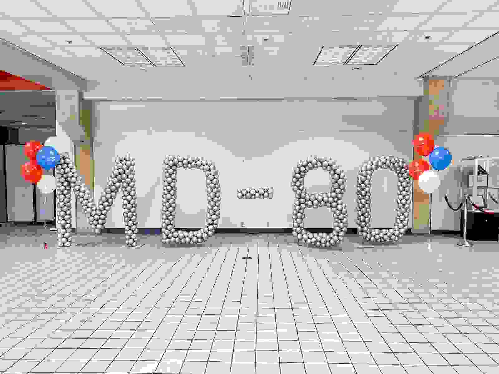 Preparations for the final flight included decking out the departure gate. Photo by Zach Griff/The Points Guy