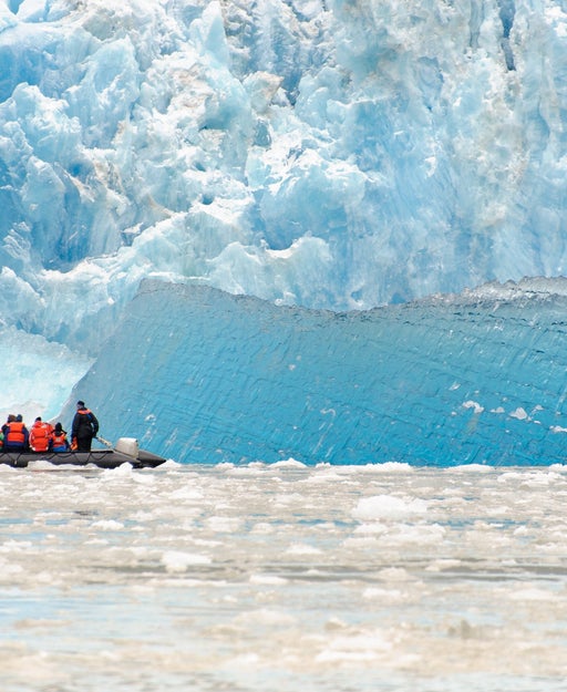 Cruise passengers on a Zodiac boat excursion in Tracy Arm fjord in Alaska