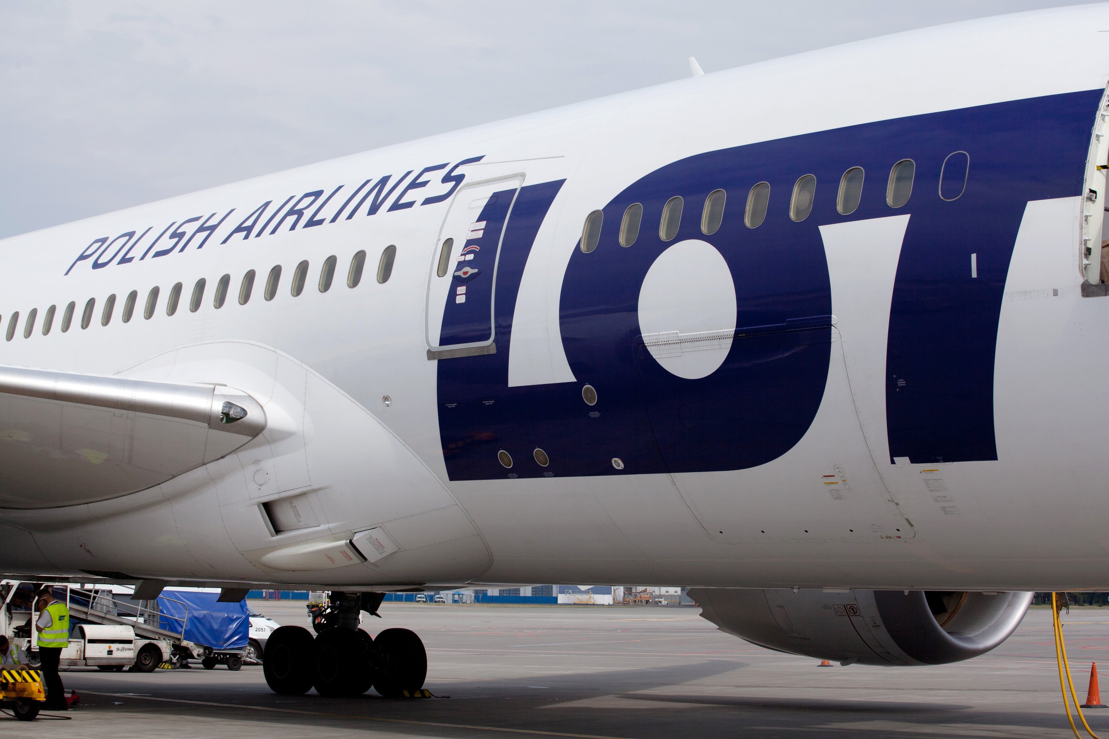 LOT Polish Airlines' logo is seen on a Boeing 787-8 Dreamliner at Warsaw Chopin airport on Aug. 29, 2015. (Photo by Piotr Malecki/Bloomberg via Getty Images)