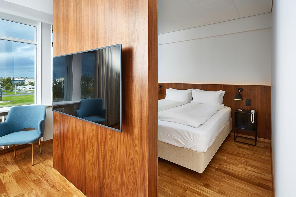 Theres a nice privacy wall between the bed and living area. Photo courtesy of Booking.com)