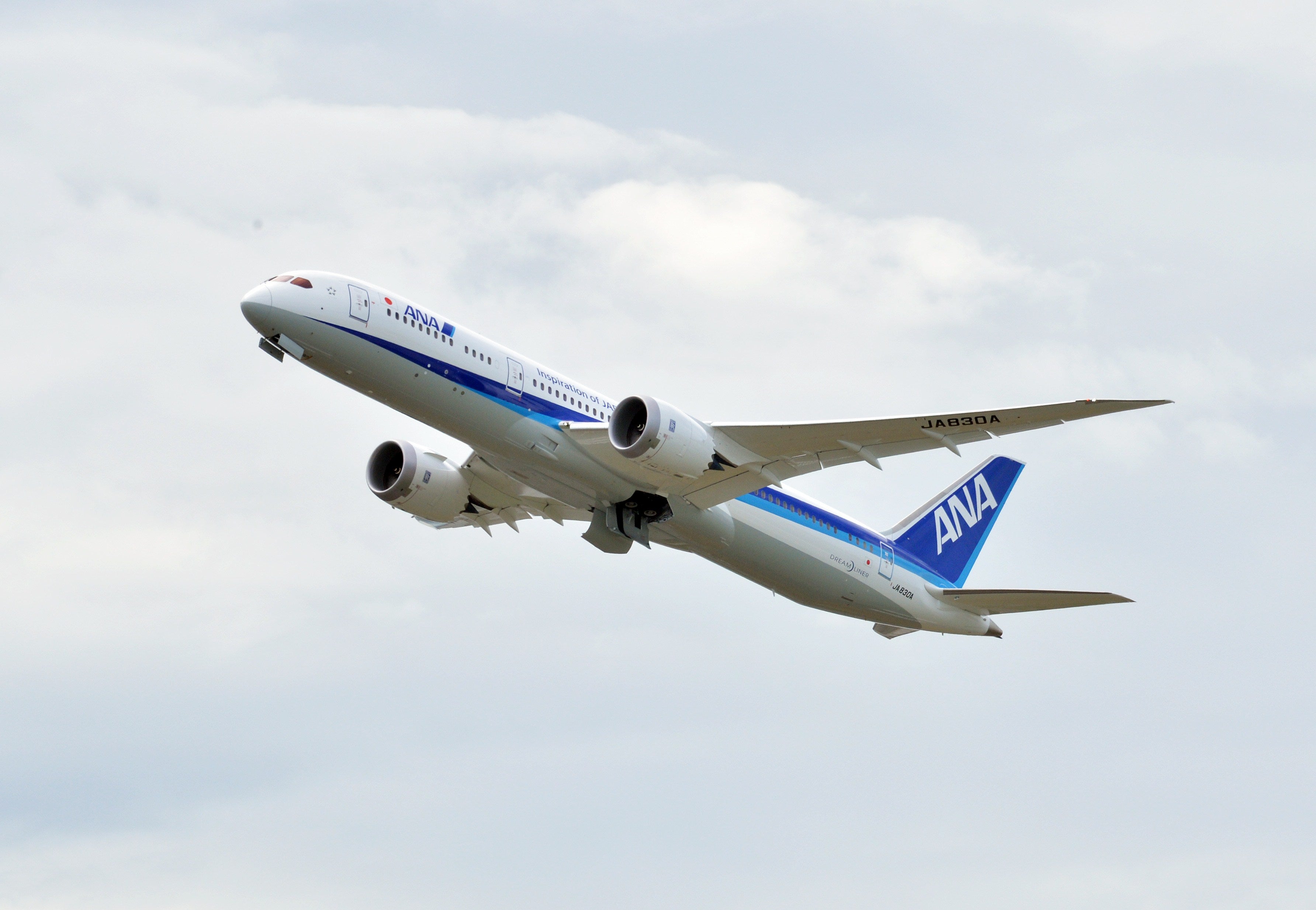 Japan's air carrier All Nippon Airways' (ANA) Boeing 787-9 takes off Tokyo's Haneda airport for the world's first passenger flight with Japanese and American children on August 4, 2014. ANA will start commercial operation using the 787-9 for domestic flights from August 7. AFP PHOTO / Yoshikazu TSUNO (Photo credit should read YOSHIKAZU TSUNO/AFP/Getty Images)
