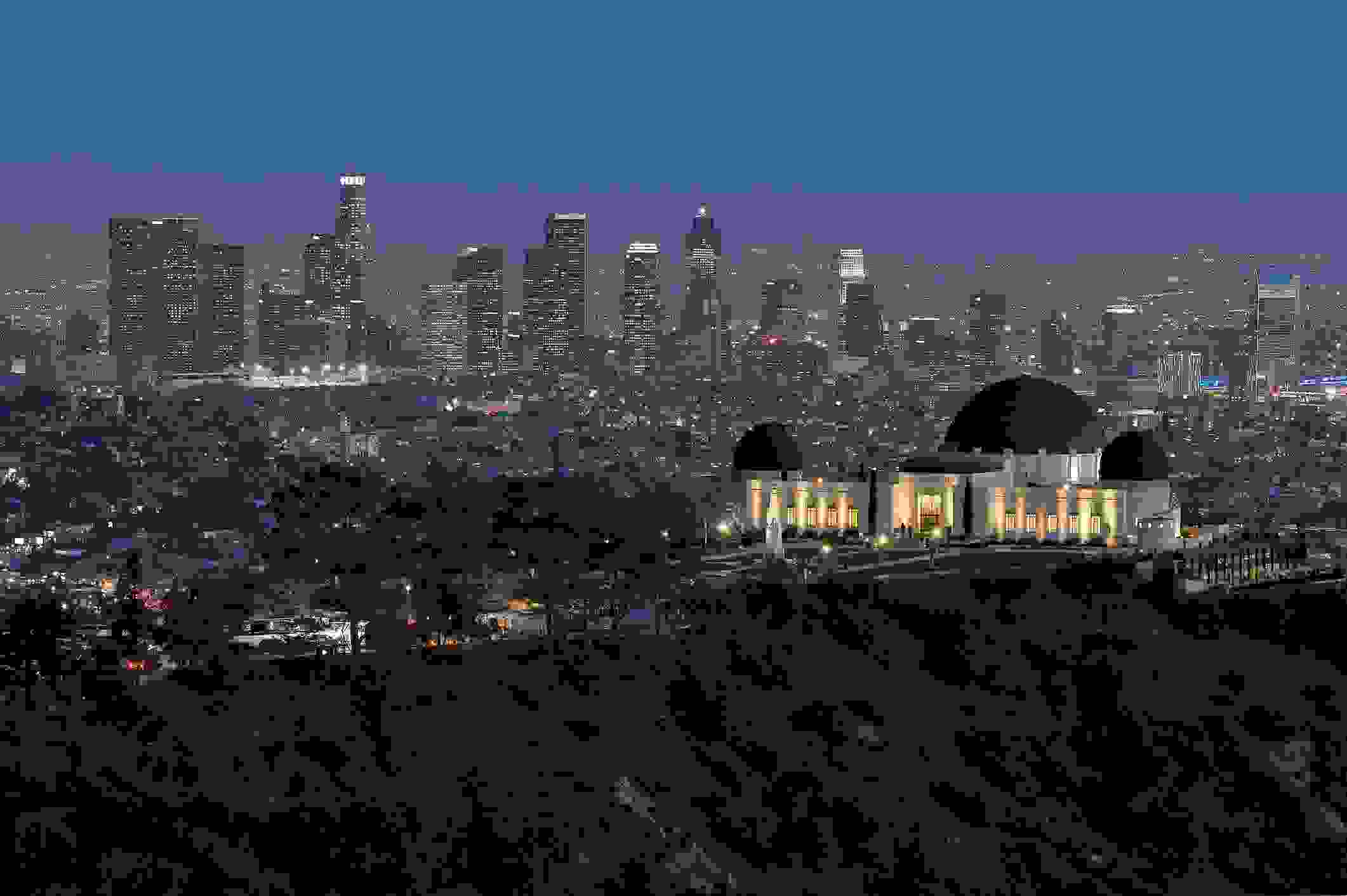 Griffith Observatory with Los Angeles skyline in the background. (Photo courtesy of TheCrimsonRibbon)