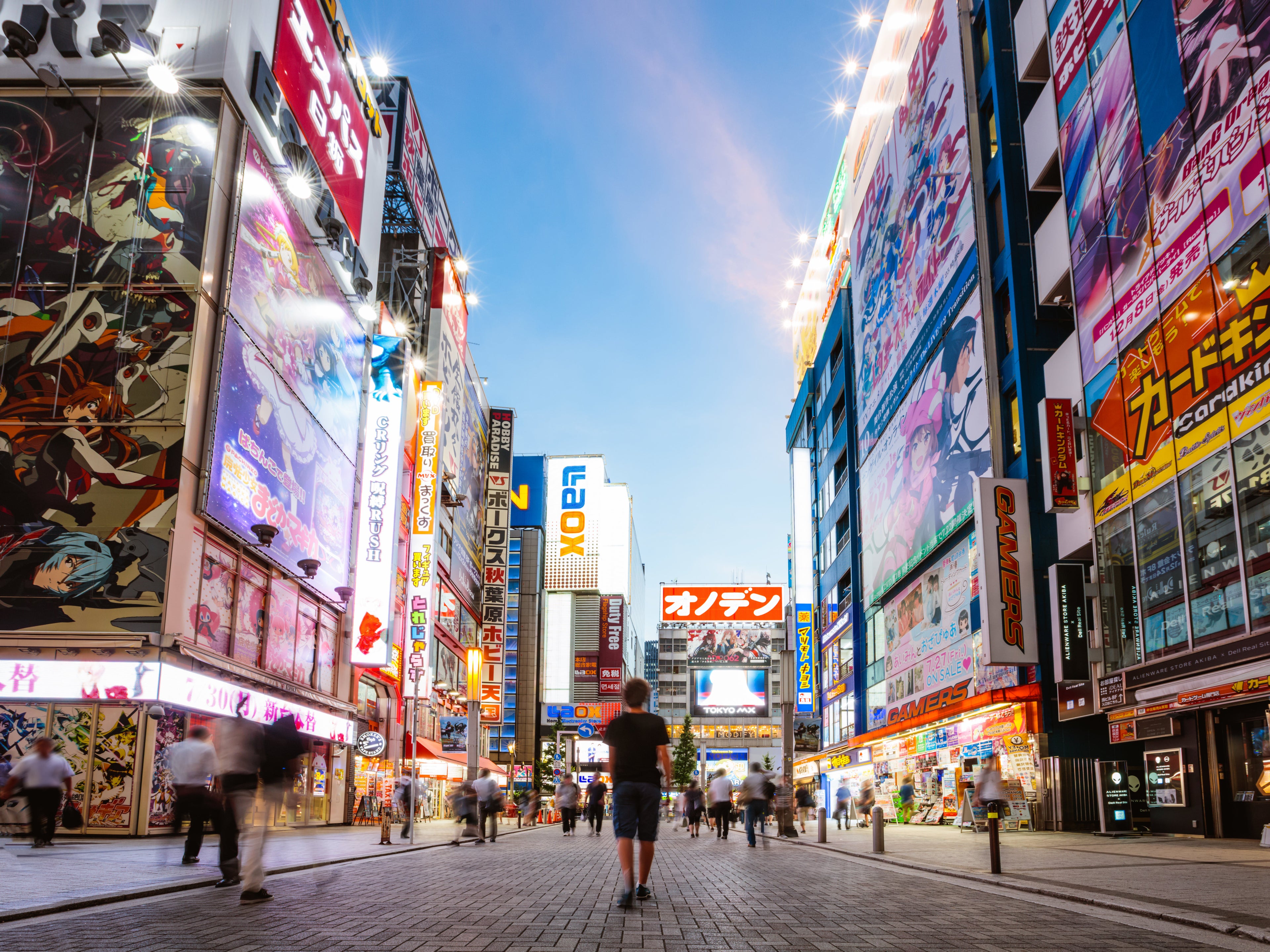 Teenager walking, Akihabara electric town, Tokyo, Japan