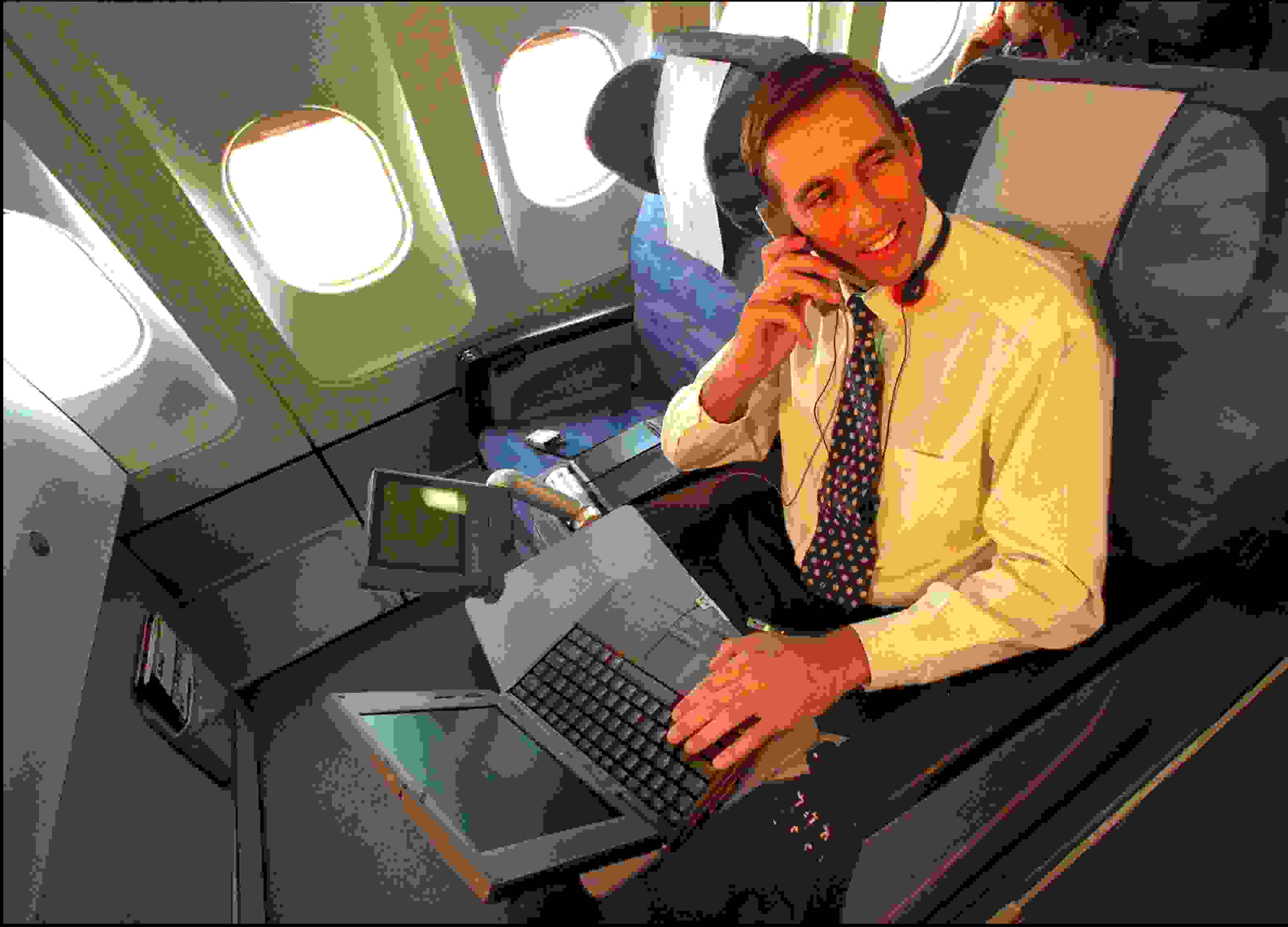 (AUSTRALIA OUT) Business Man Travelling on Singapore Airlines A340 Airbus "Business Class" which has all the Mod-Cons, on 28 February 1998. THE AGE BUSINESS Picture by CATHRYN TREMAIN (Photo by Fairfax Media via Getty Images/Fairfax Media via Getty Images via Getty Images)