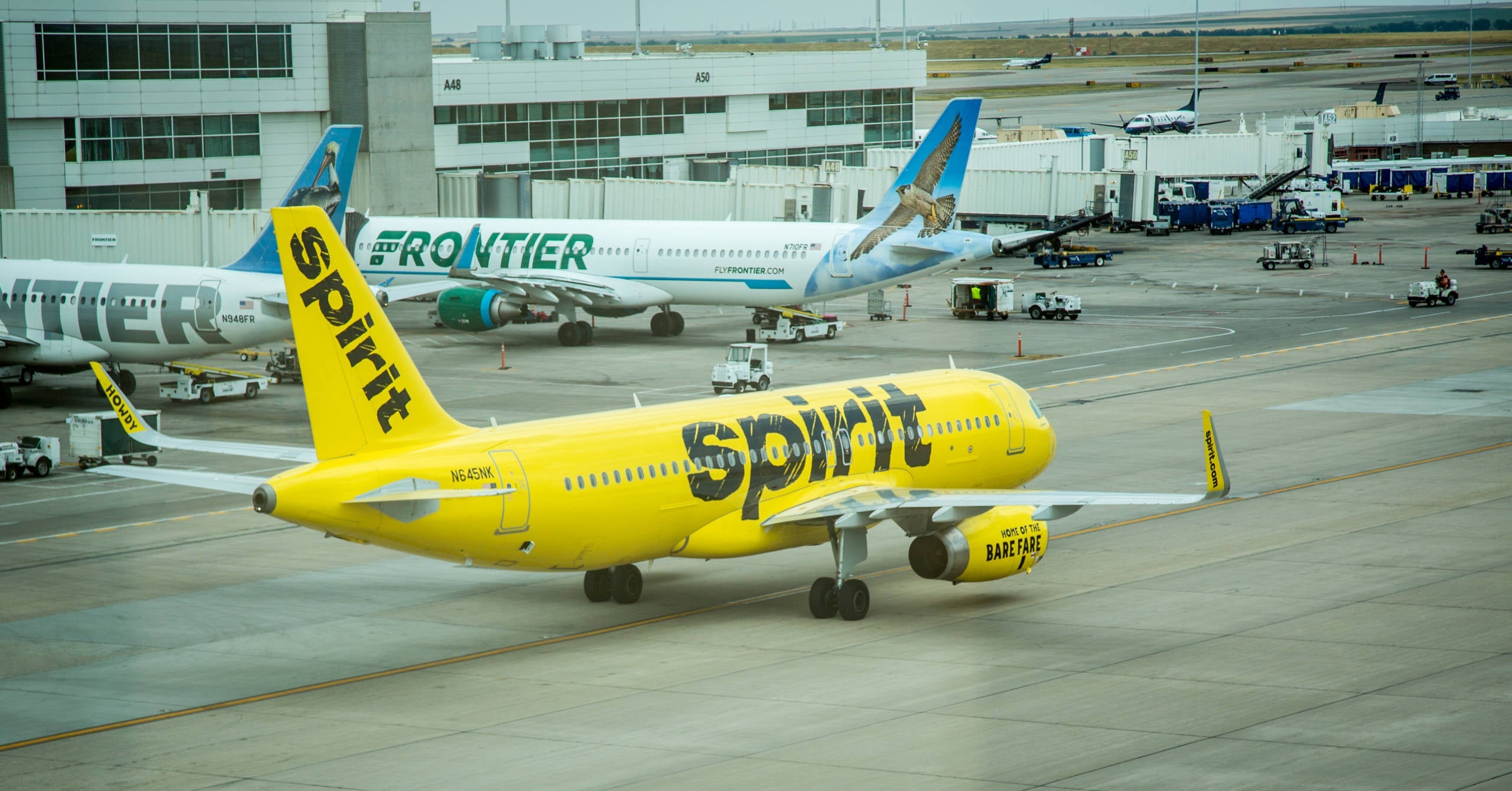 Spirit Airlines and Frontier Airlines planes at Denver. (Photo courtesy of Denver International Airport.