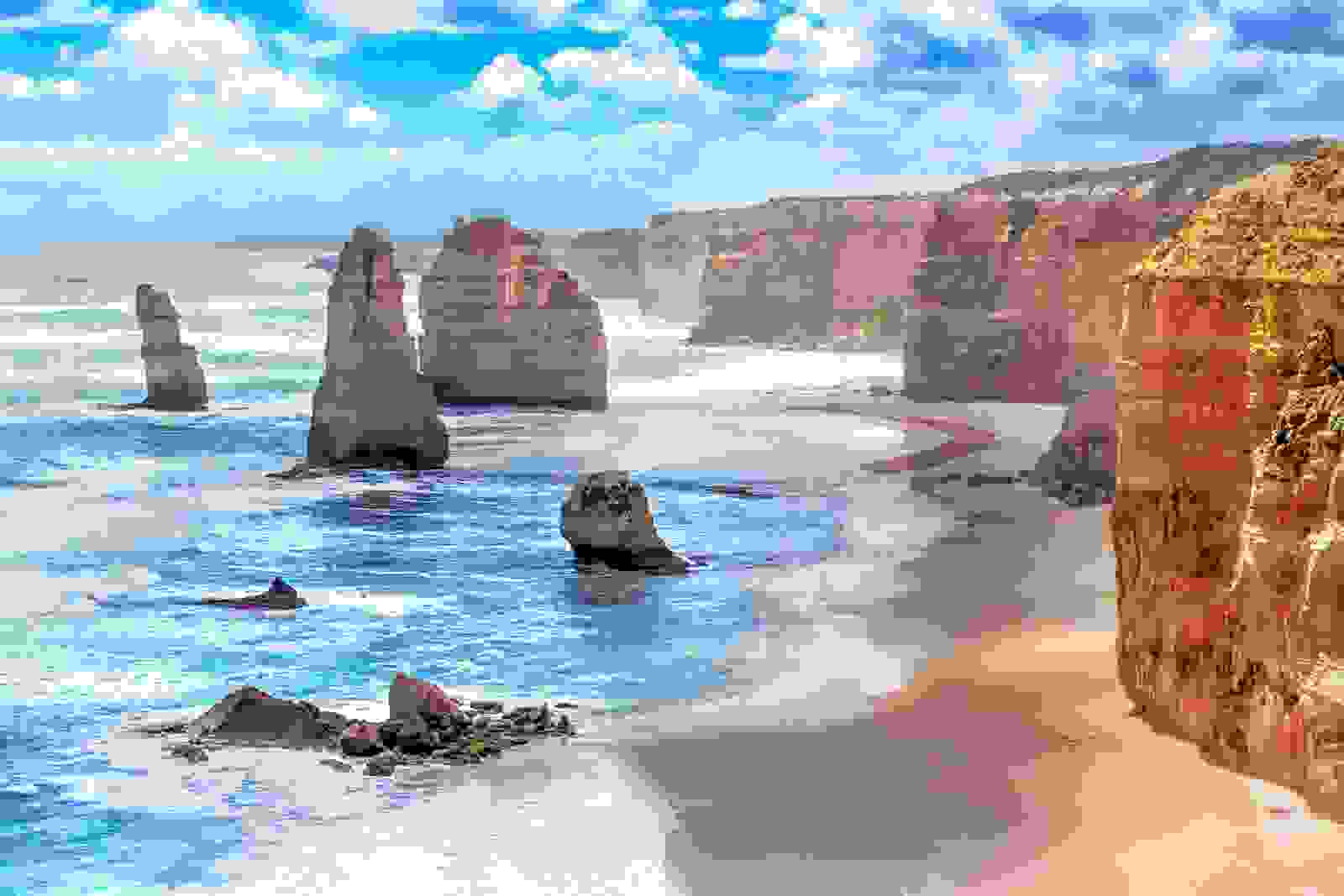 The Twelve Apostles and Orange Cliffs along Australia's Great Ocean Road. (Photo by Tero Hakala/Shutterstock)