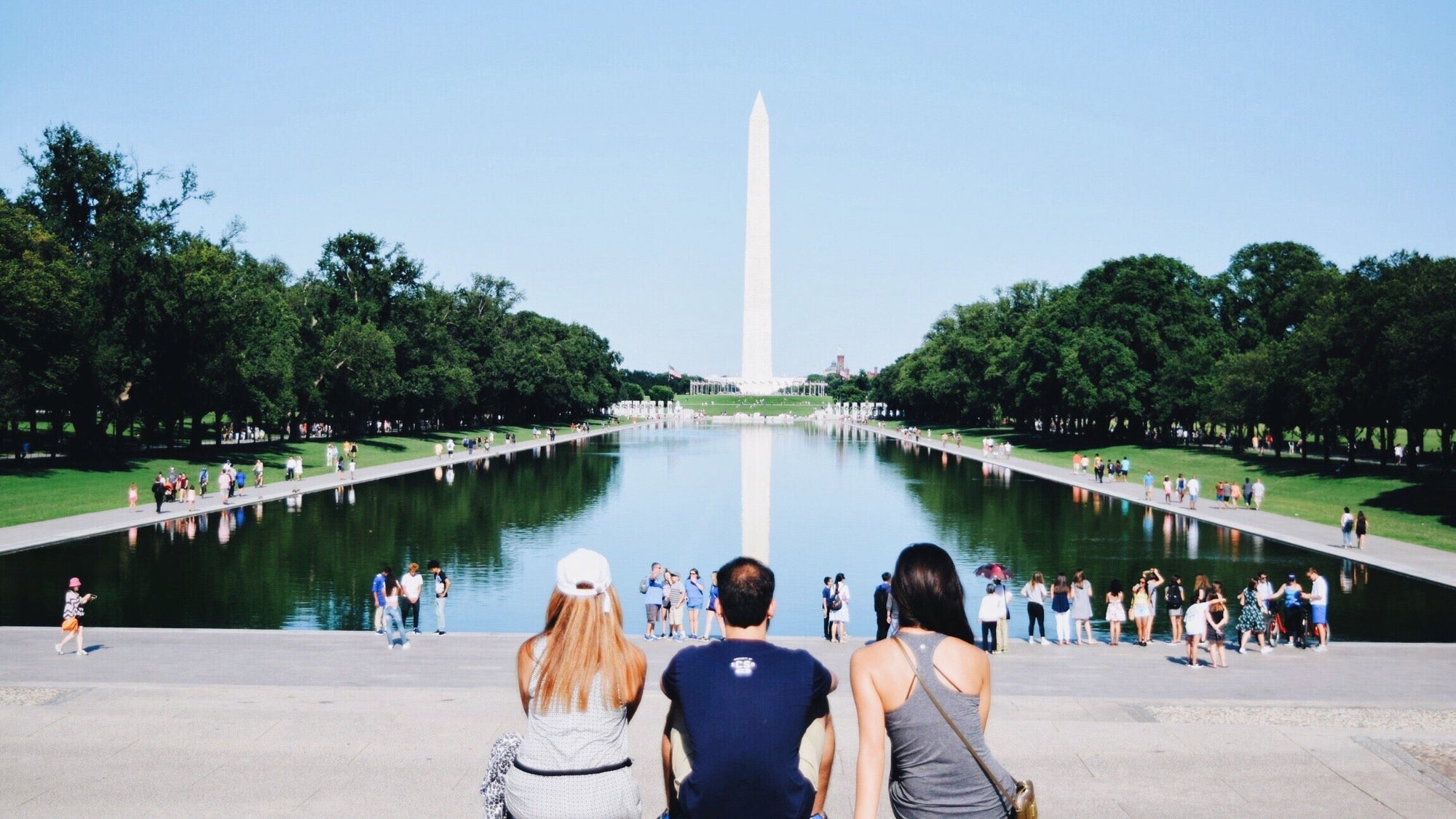 People Against Reflecting Pool And Washington Monument