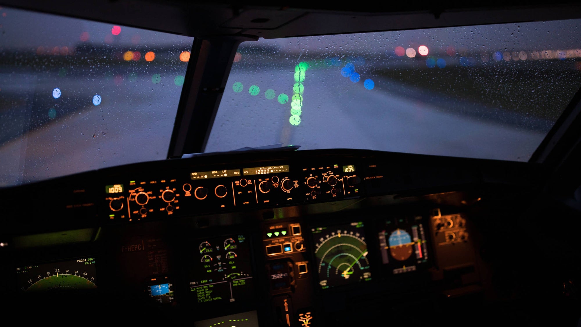 Modern cockpit a commercial airliner airplane during takeoff