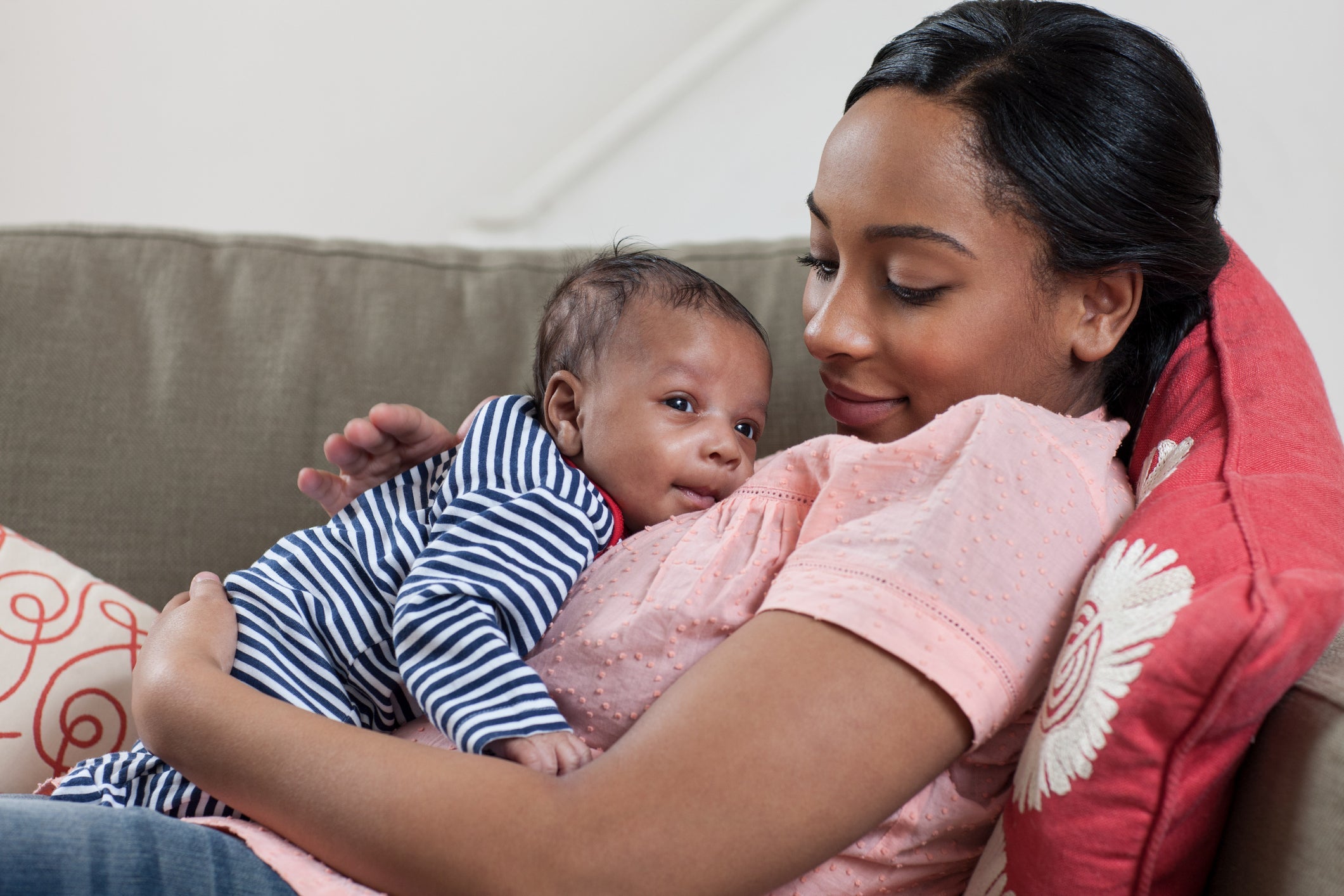 mother and baby on sofa