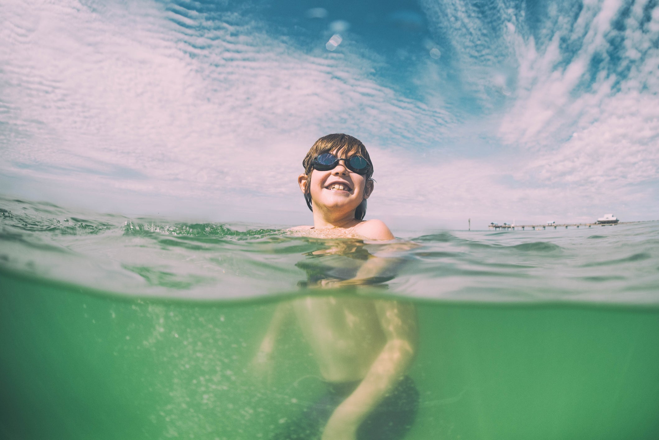 boy swimming in Florida Gulf Coast