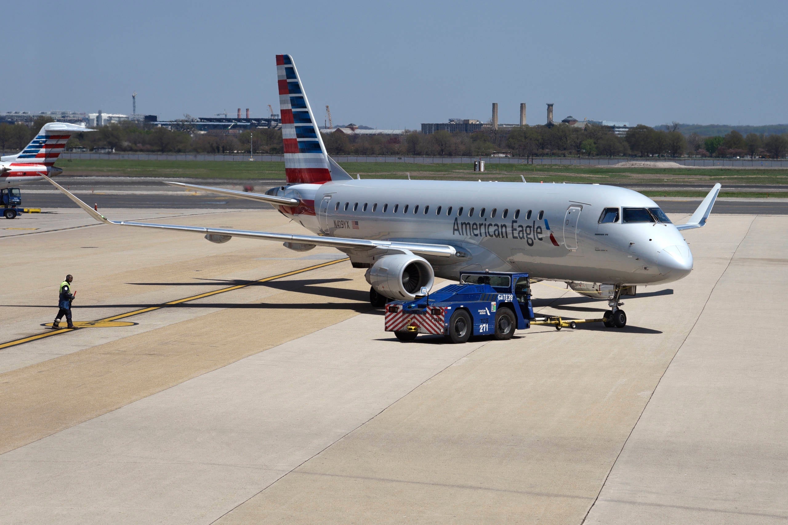 An American Airlines Embraer ERJ175 aircraft is pushed from its gate at Ronald Reagan Washington National Airport. (Photo by Robert Alexander/Getty Images)