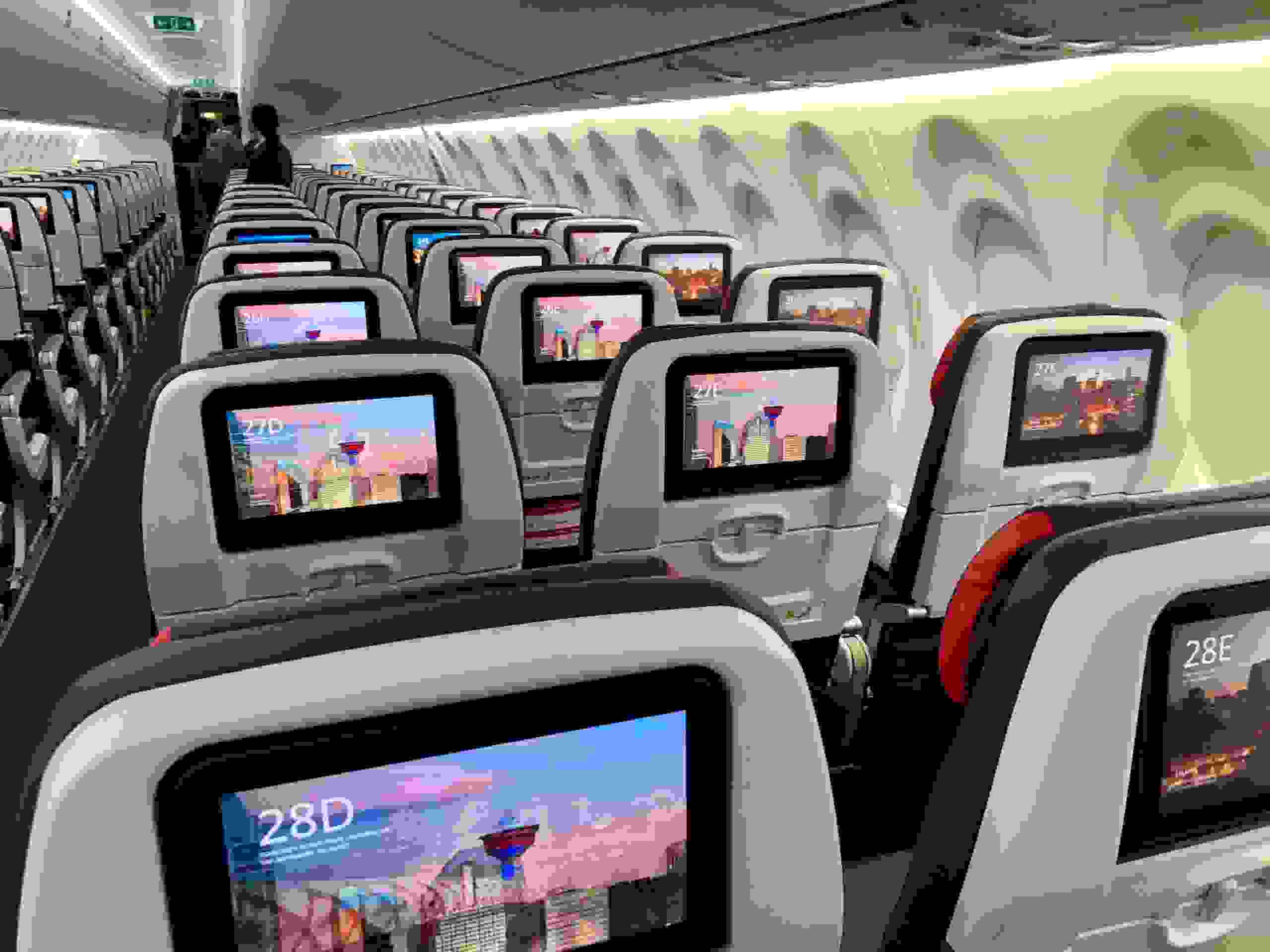 Each seat on Air Canada's A220 has a personal video screen. (Photo by Edward Russell/TPG)