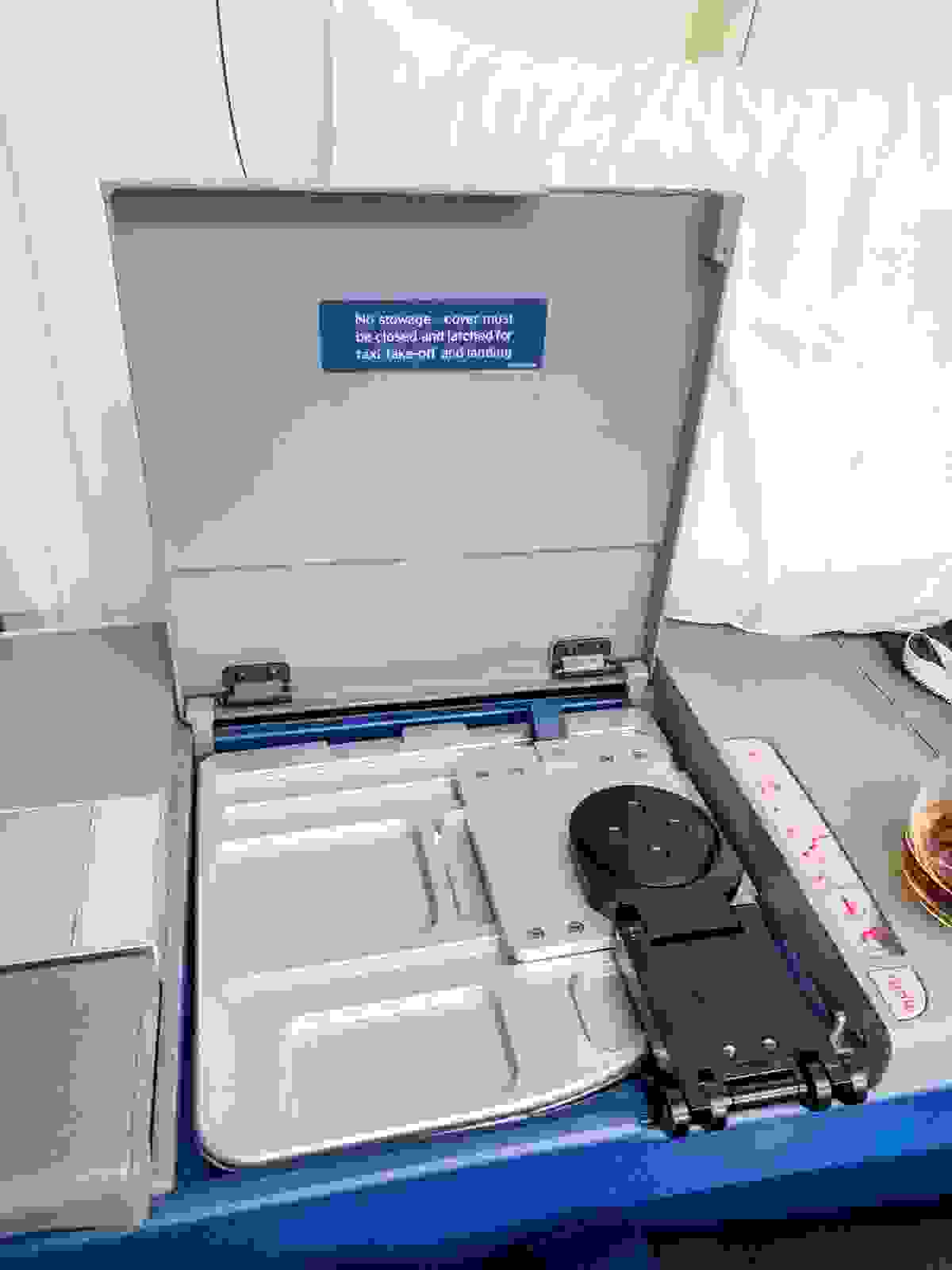 Partially open tray table on the Delta 767-300ER.